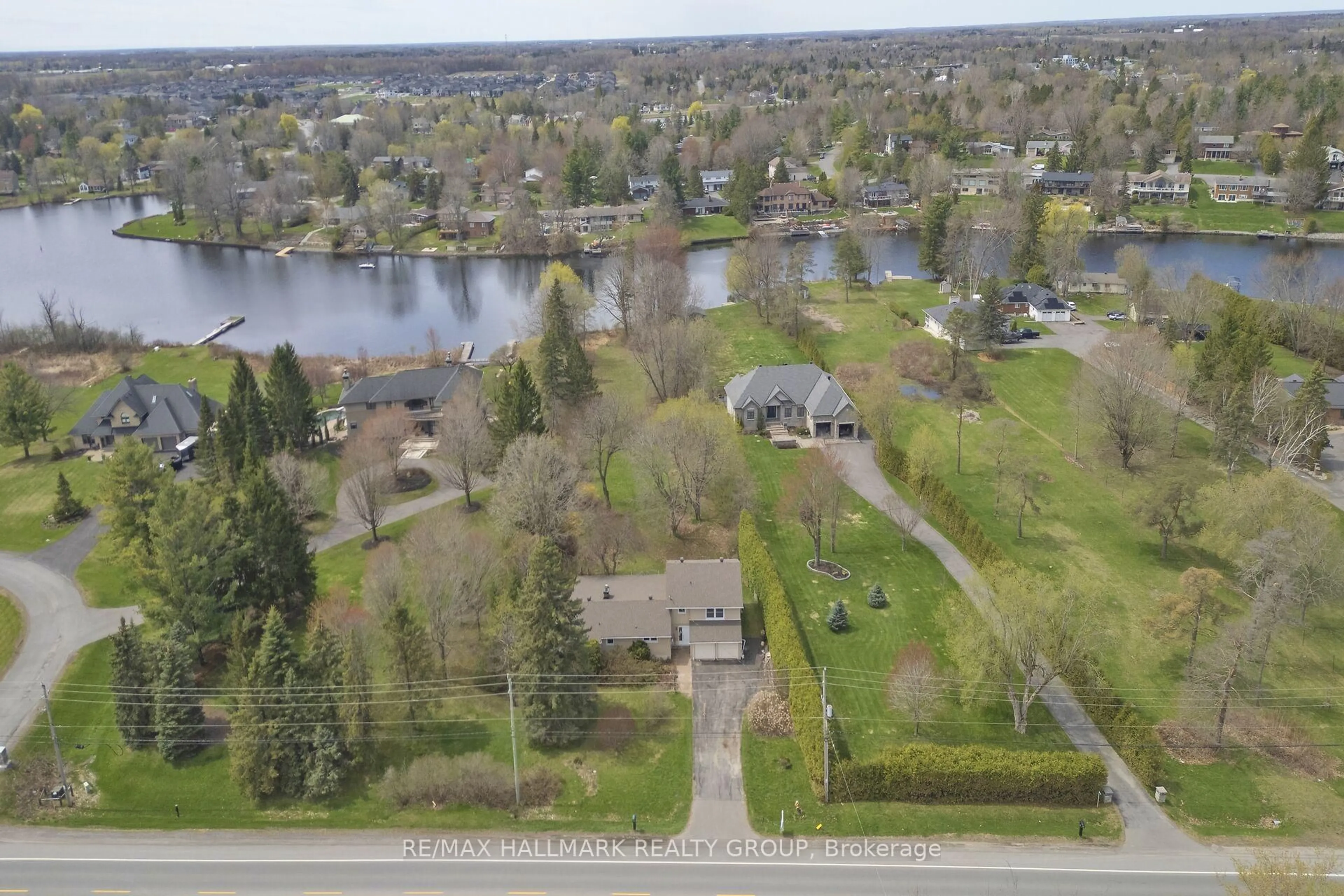 A pic from outside/outdoor area/front of a property/back of a property/a pic from drone, water/lake/river/ocean view for 1236 River Rd, Ottawa Ontario K4M 1B4