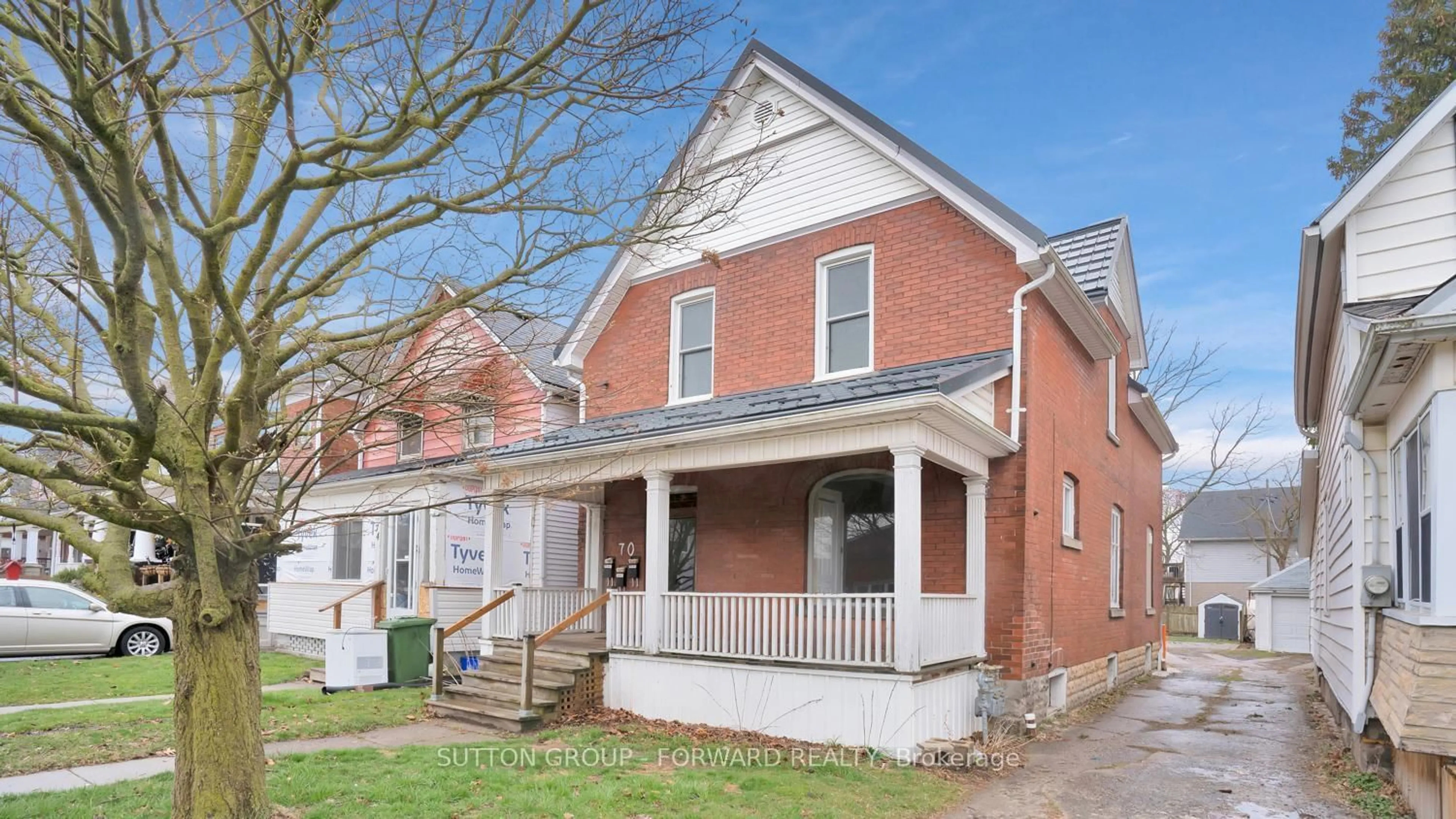 Home with brick exterior material, street for 70 Ross St, St. Thomas Ontario N5R 3X7