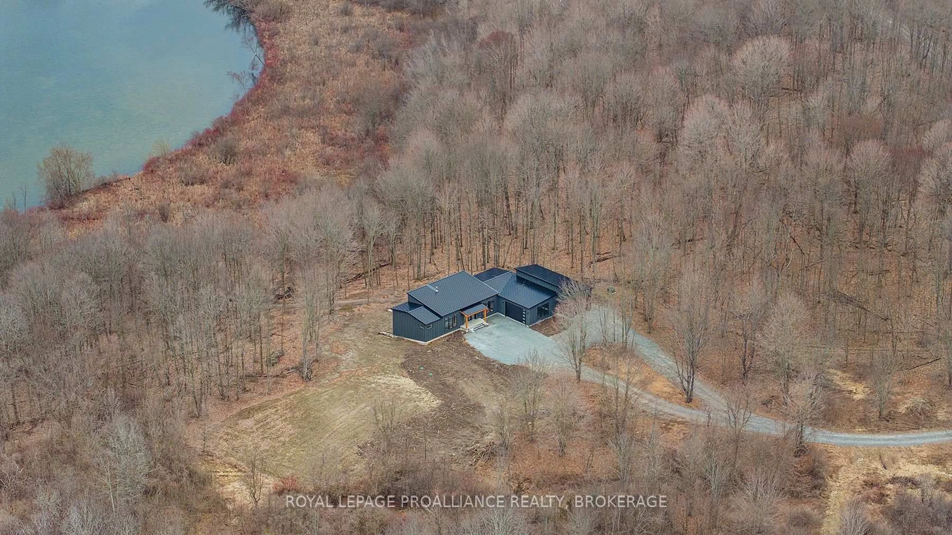 A pic from outside/outdoor area/front of a property/back of a property/a pic from drone, water/lake/river/ocean view for 2872 Beach Nut Rd, Inverary Ontario K0H 1X0