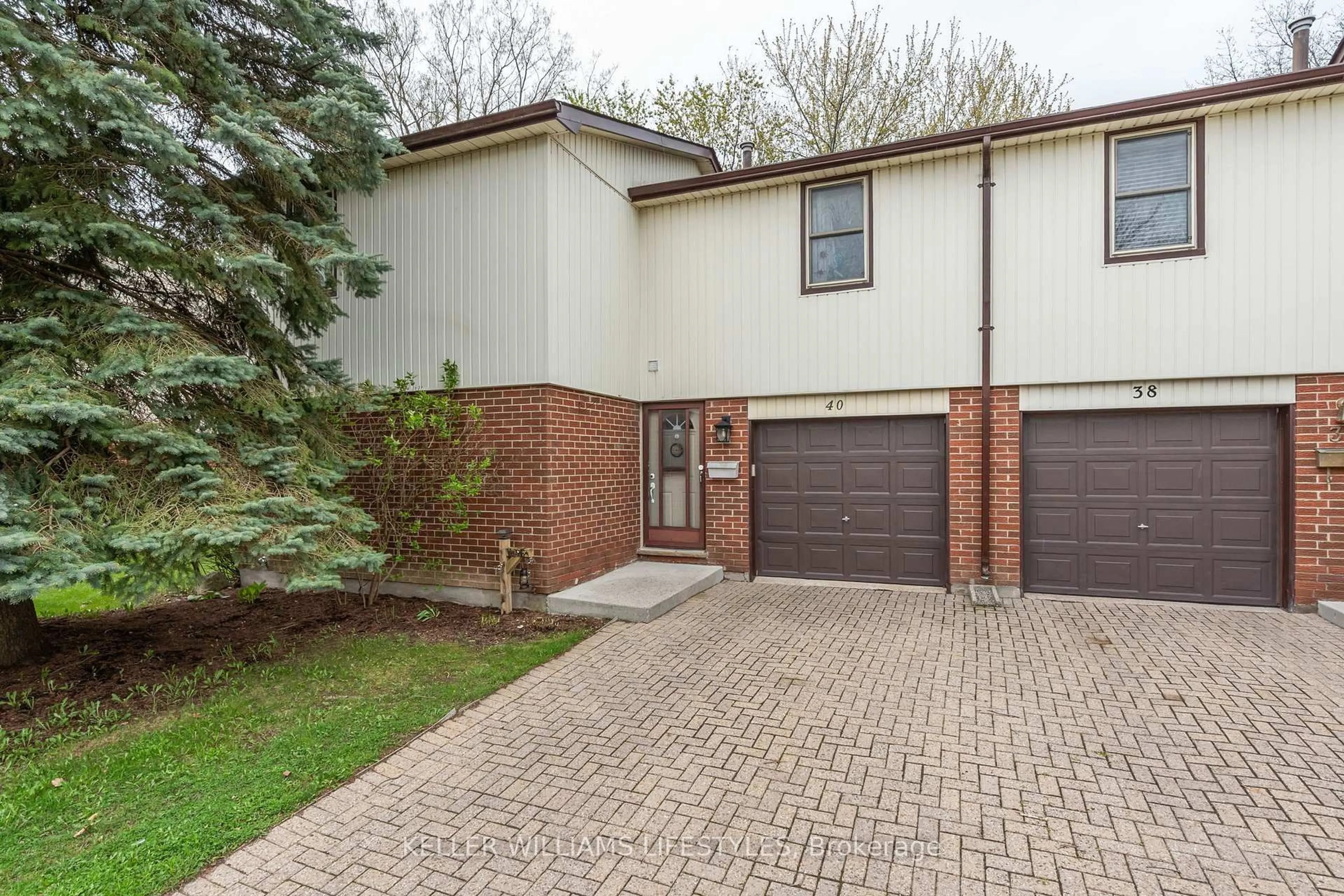 Home with brick exterior material, street for 971 Adelaide St #40, London South Ontario N6E 2H3