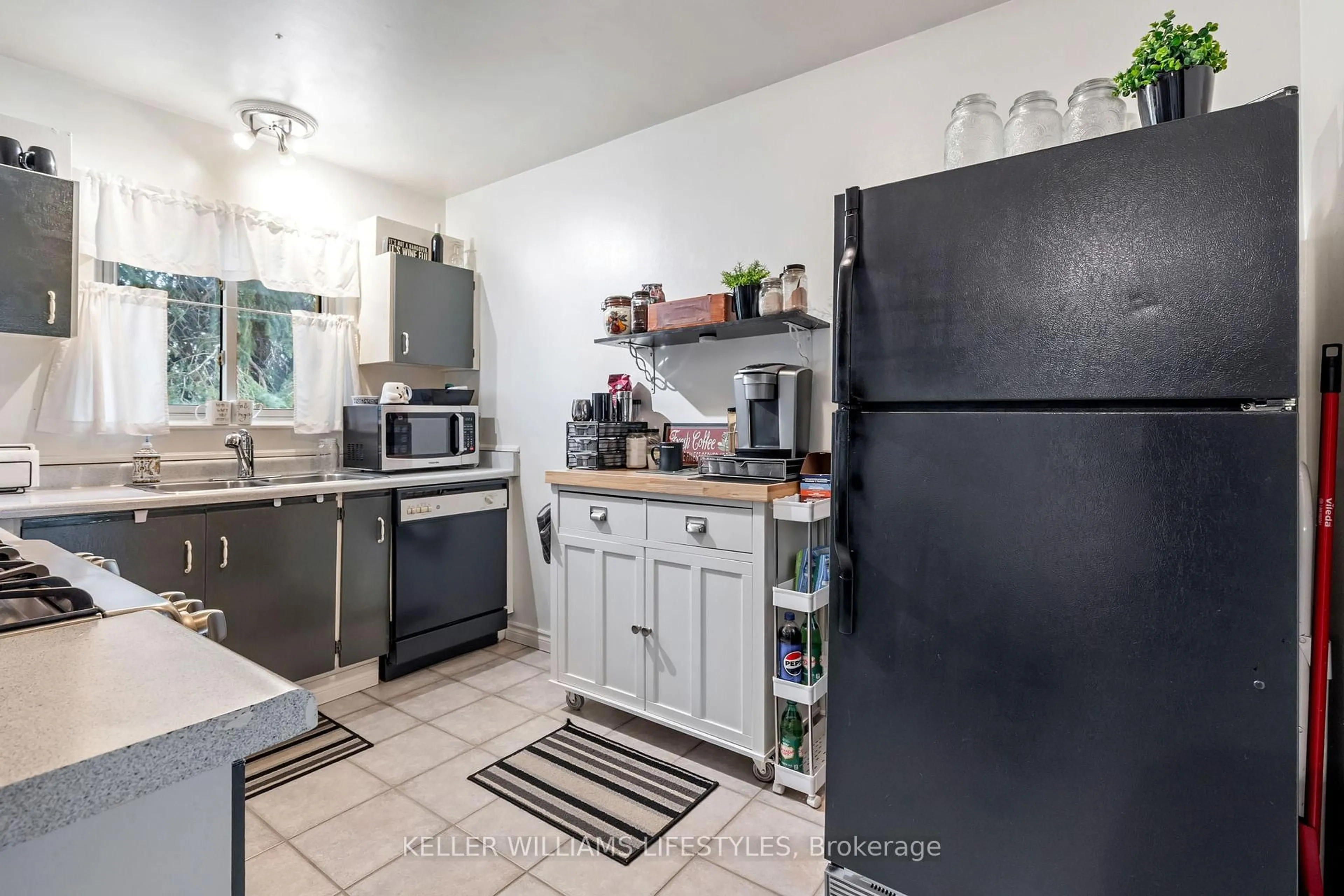 Standard kitchen, ceramic/tile floor for 971 Adelaide St #40, London South Ontario N6E 2H3