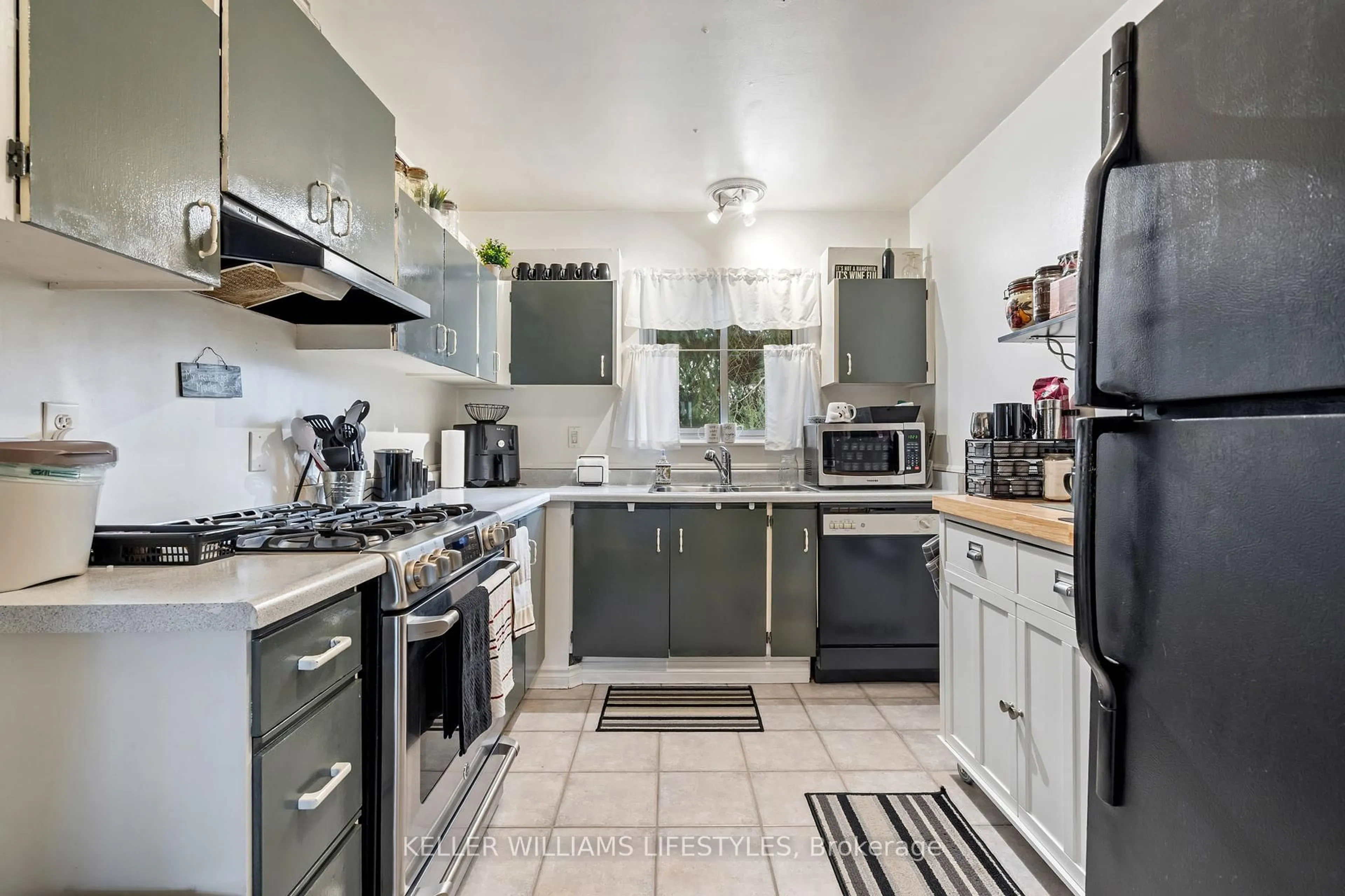 Standard kitchen, ceramic/tile floor for 971 Adelaide St #40, London South Ontario N6E 2H3