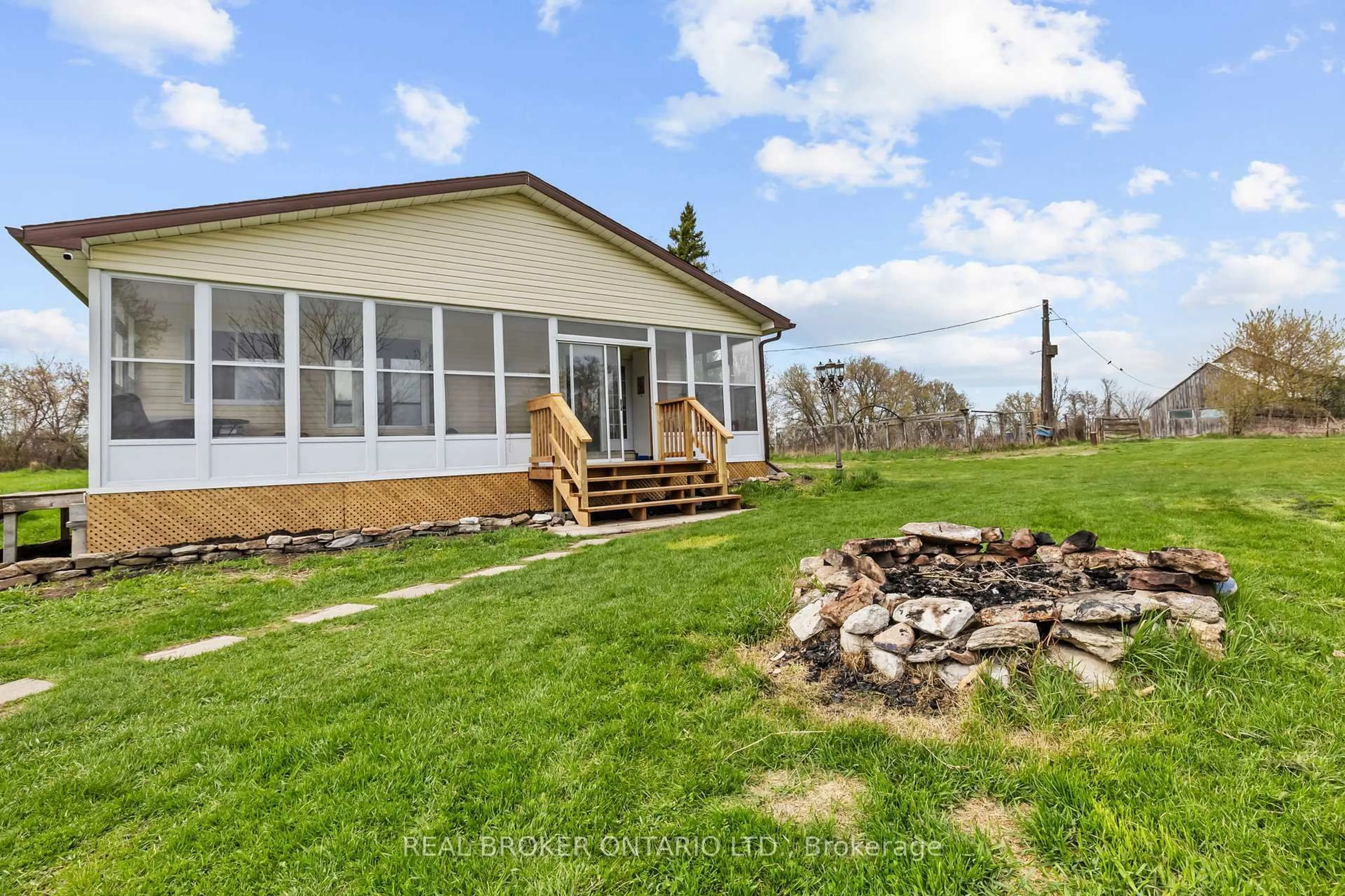 A pic from outside/outdoor area/front of a property/back of a property/a pic from drone, water/lake/river/ocean view for 183 Wolfe Lake Rd, Rideau Lakes Ontario K0G 1X0