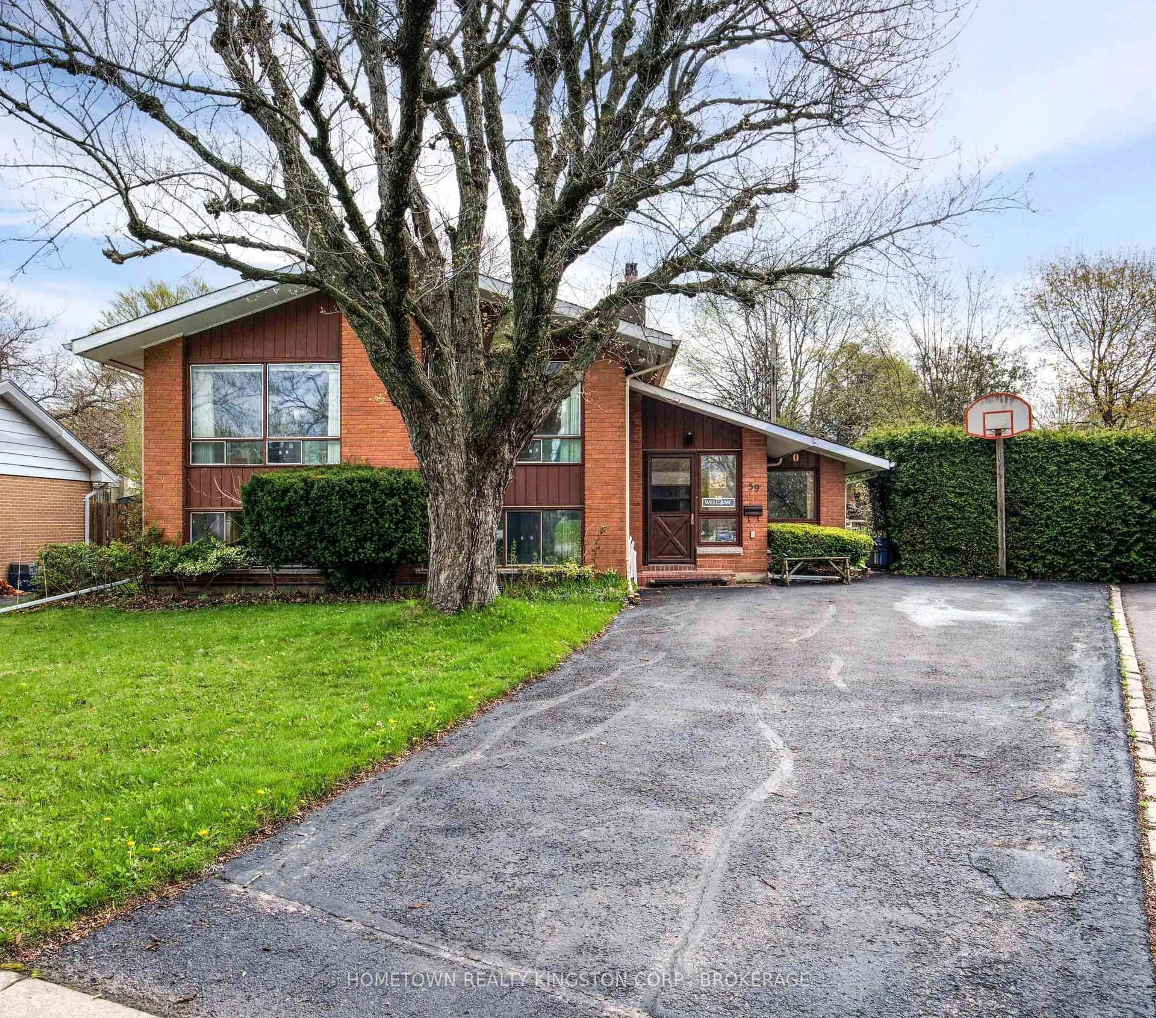 Home with brick exterior material, street for 59 Holland Cres, Kingston Ontario K7M 2V7