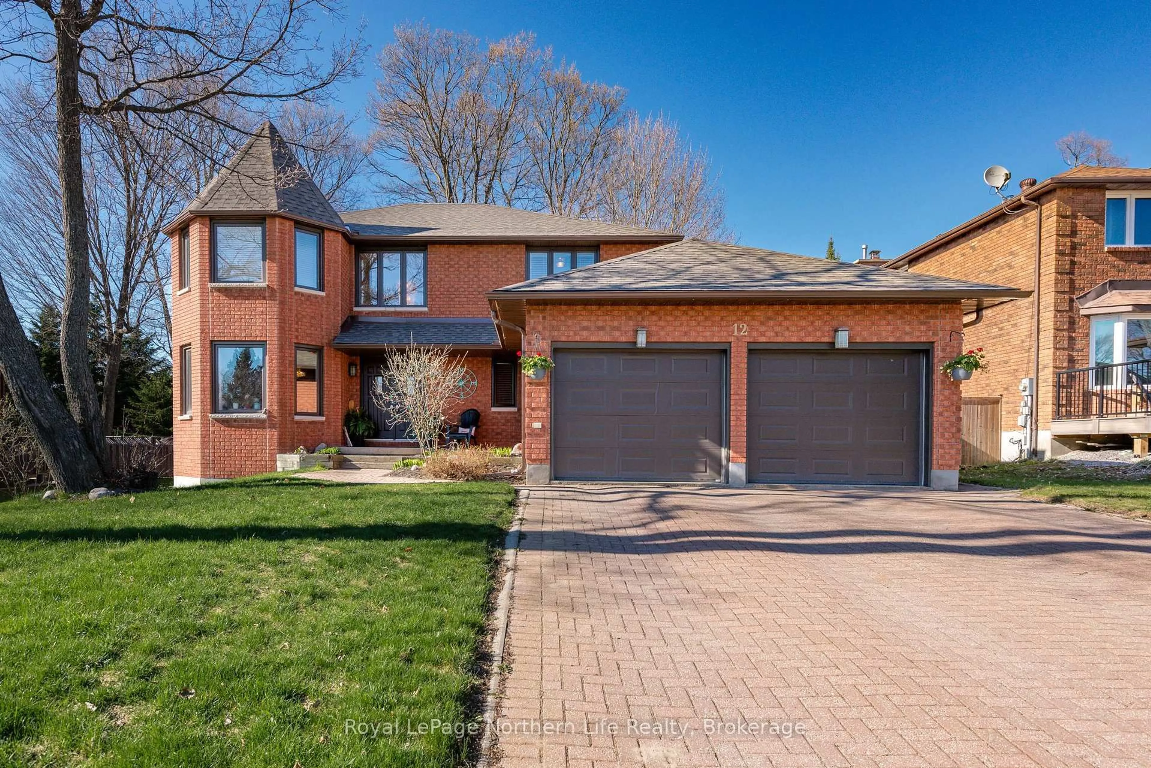 Home with brick exterior material, street for 12 Canterbury Cres, North Bay Ontario P1C 1K7