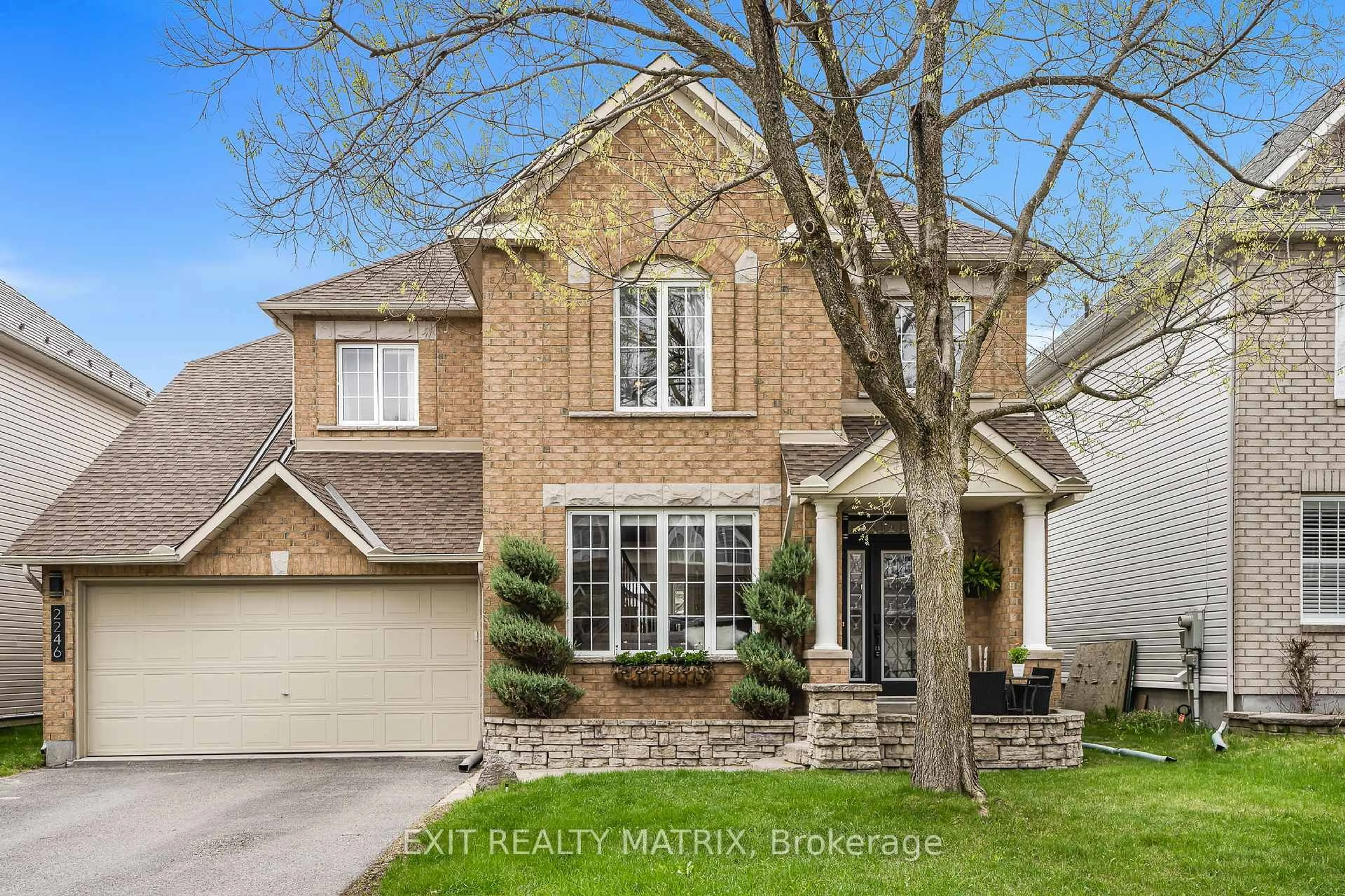 Home with brick exterior material, street for 2246 Des Grands Champs Way, Ottawa Ontario K1W 1K1