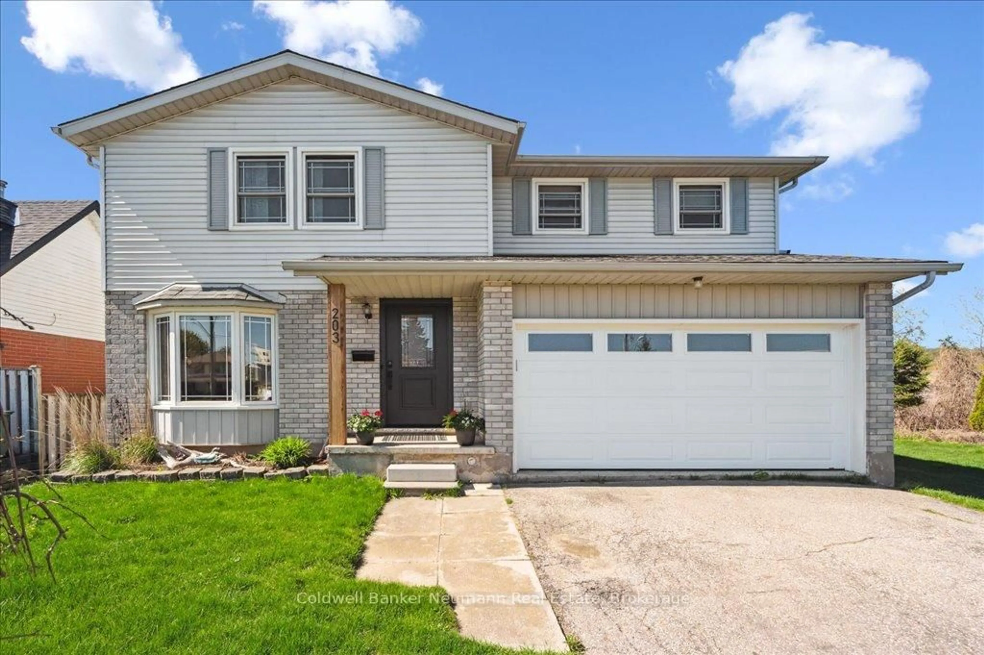 Home with vinyl exterior material, street for 203 Elmira Rd, Guelph Ontario N1K 1R2