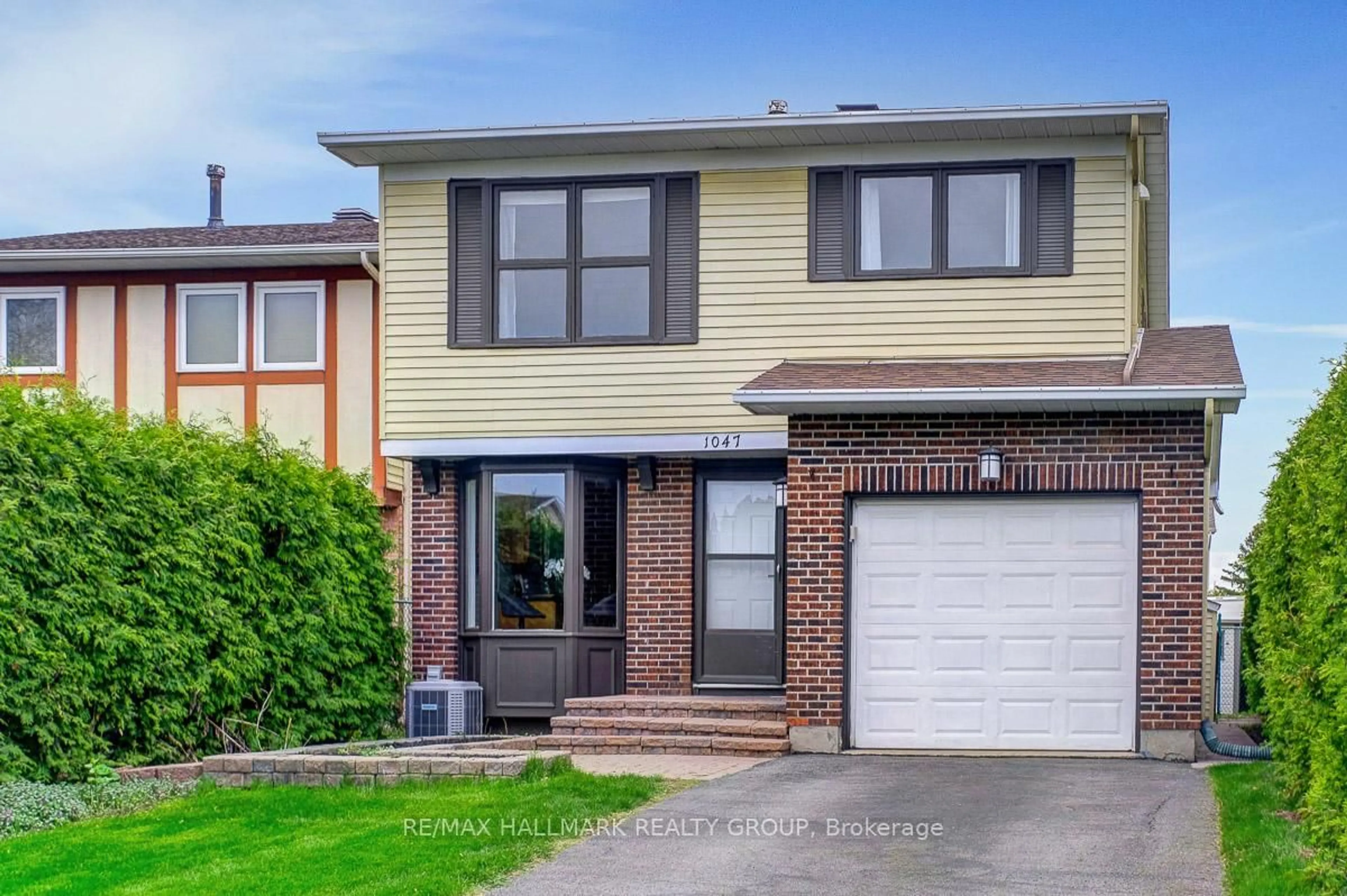 Home with brick exterior material, street for 1047 Arrowhead Pl, Ottawa Ontario K1C 2S5