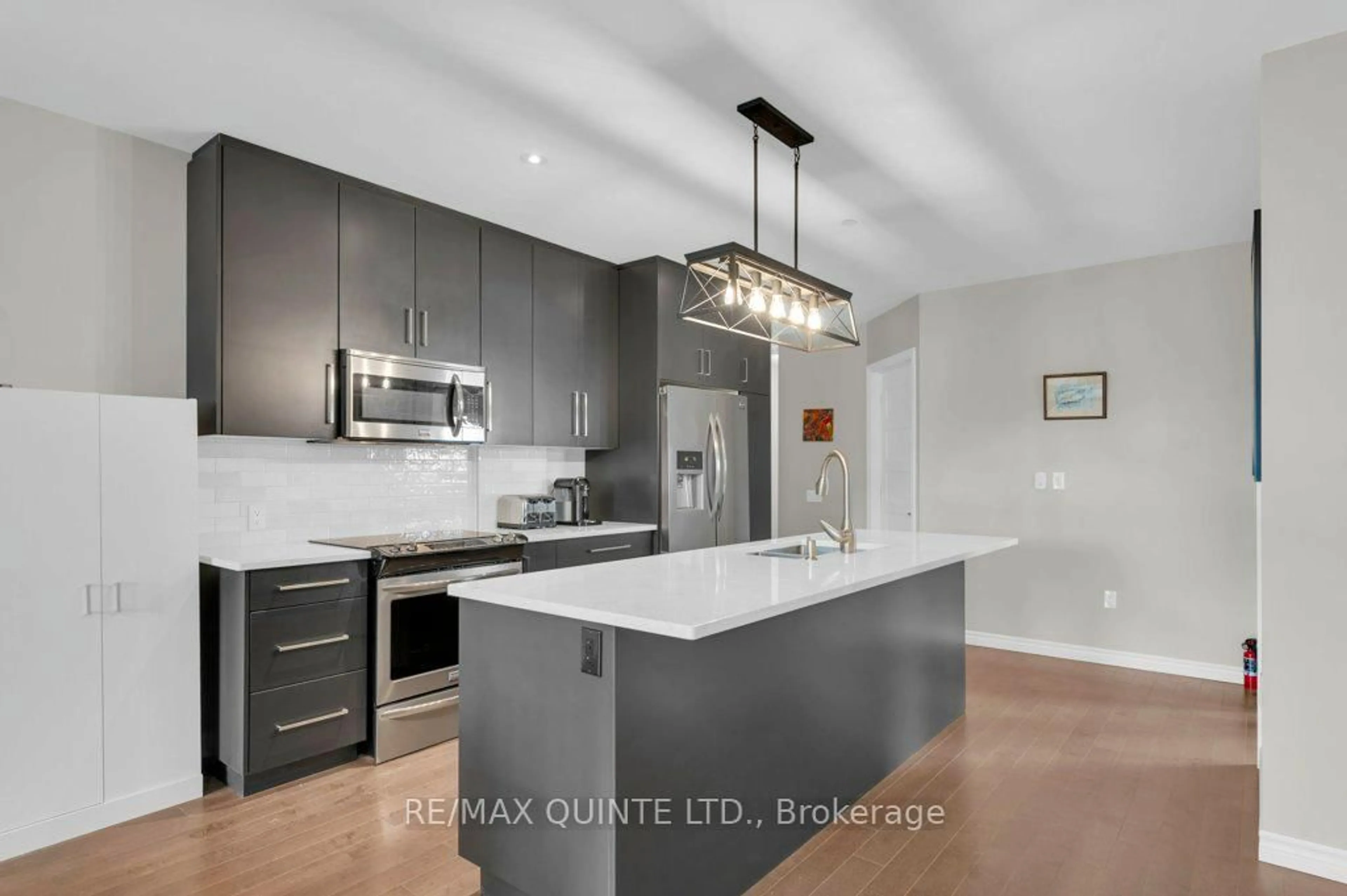 Open concept kitchen, ceramic/tile floor for 199 Front St #410, Belleville Ontario K8N 5H5