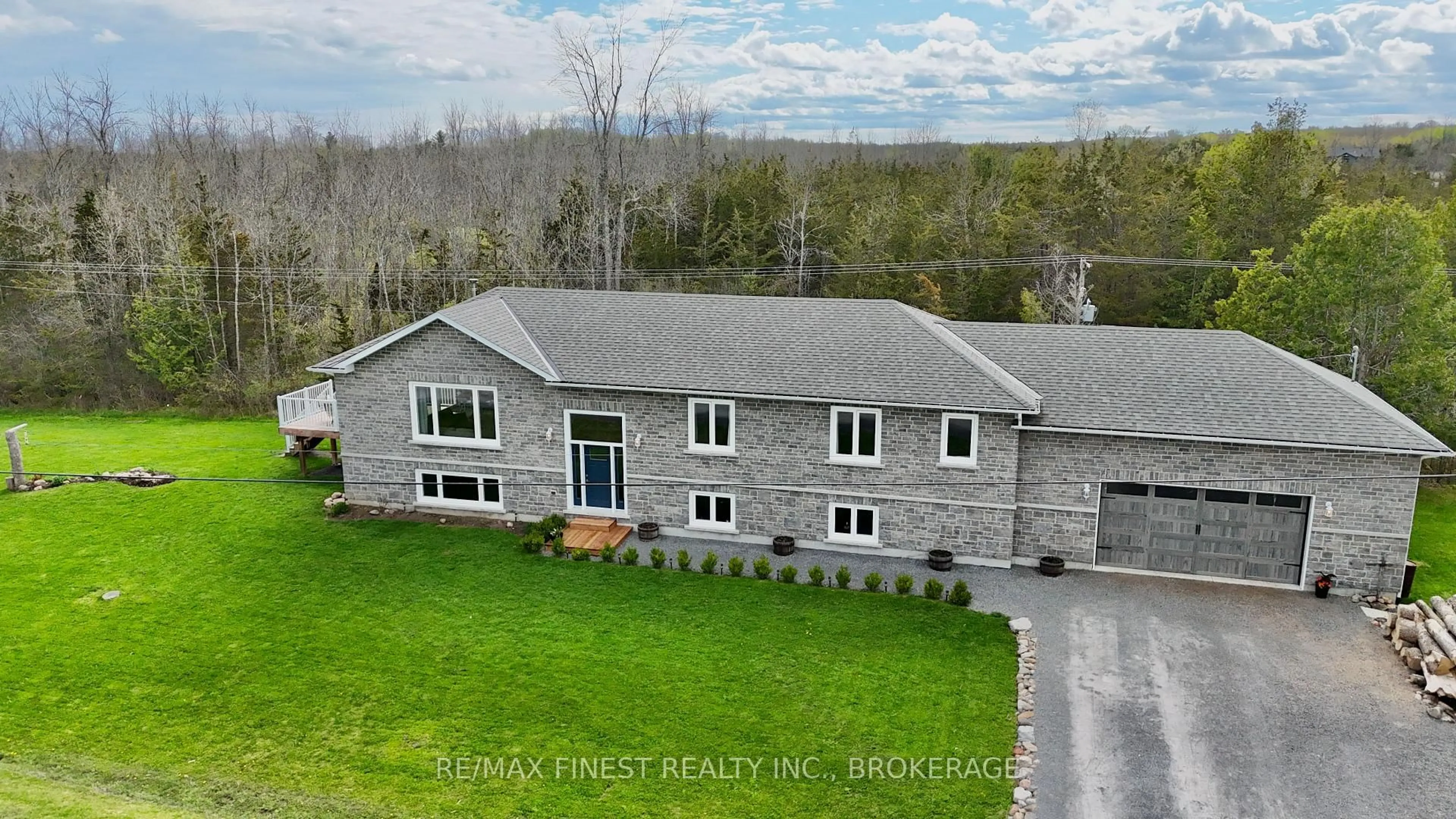A pic from outside/outdoor area/front of a property/back of a property/a pic from drone, building for 892 Irish Rd, Bissett Creek Ontario K0H 2H0