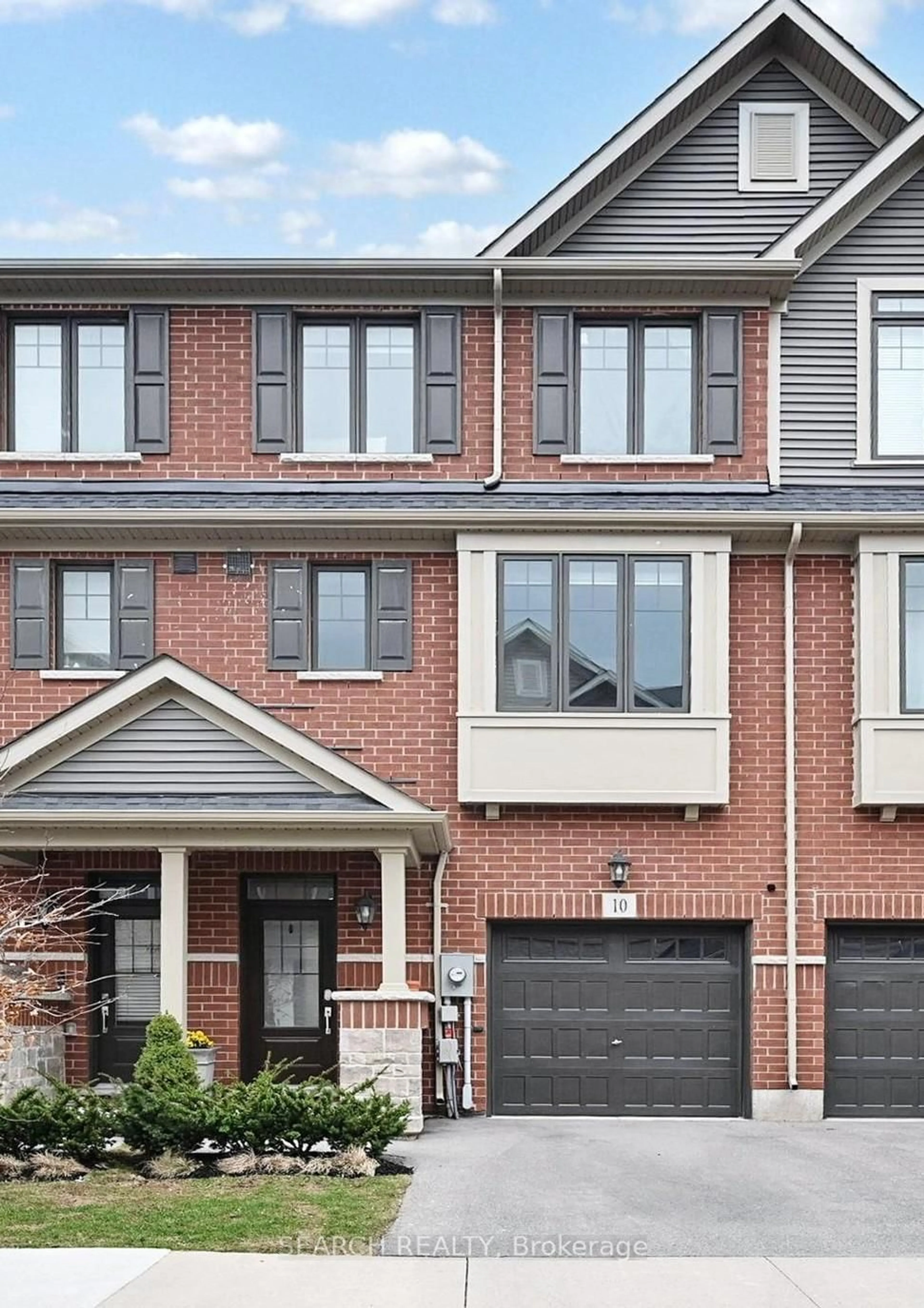 Home with brick exterior material, street for 10 Snowberry Lane, Hamilton Ontario L8K 0A4
