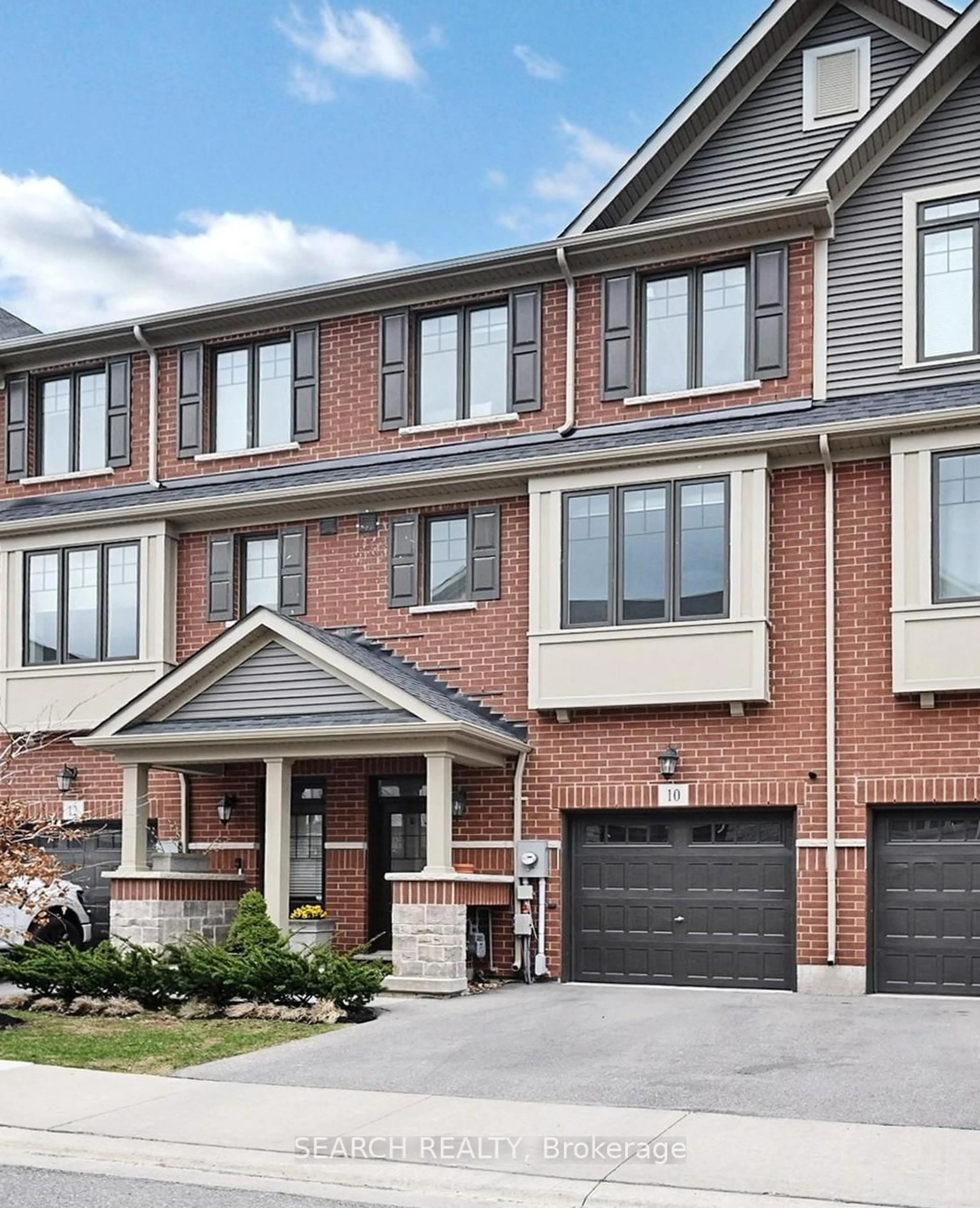 Home with brick exterior material, street for 10 Snowberry Lane, Hamilton Ontario L8K 0A4