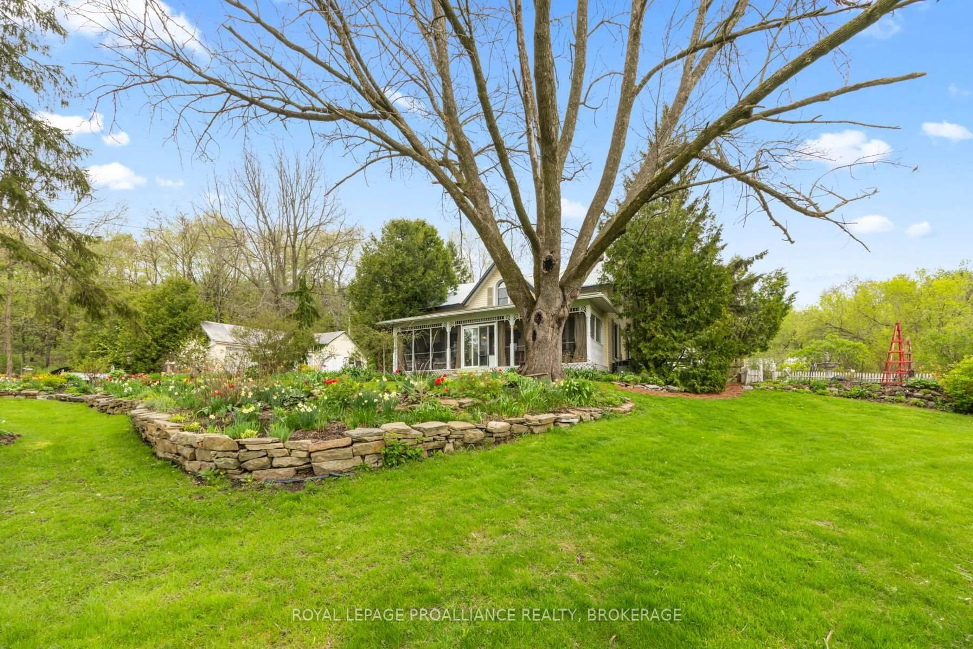 A pic from outside/outdoor area/front of a property/back of a property/a pic from drone, unknown for 2078 Sunbury Rd, Inverary Ontario K0H 1X0