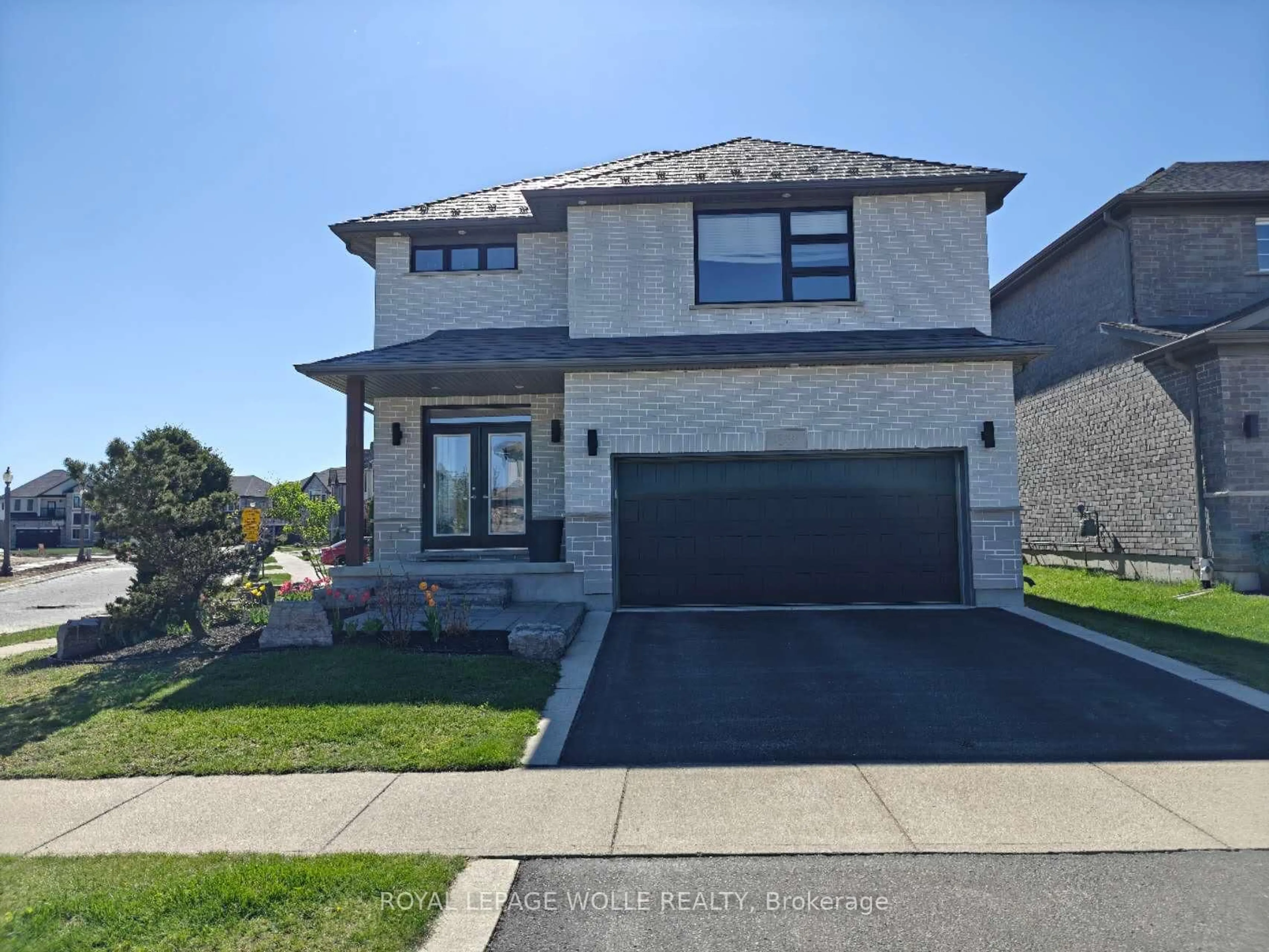Home with brick exterior material, street for 69 Eaglecrest St, Kitchener Ontario N2K 0B8