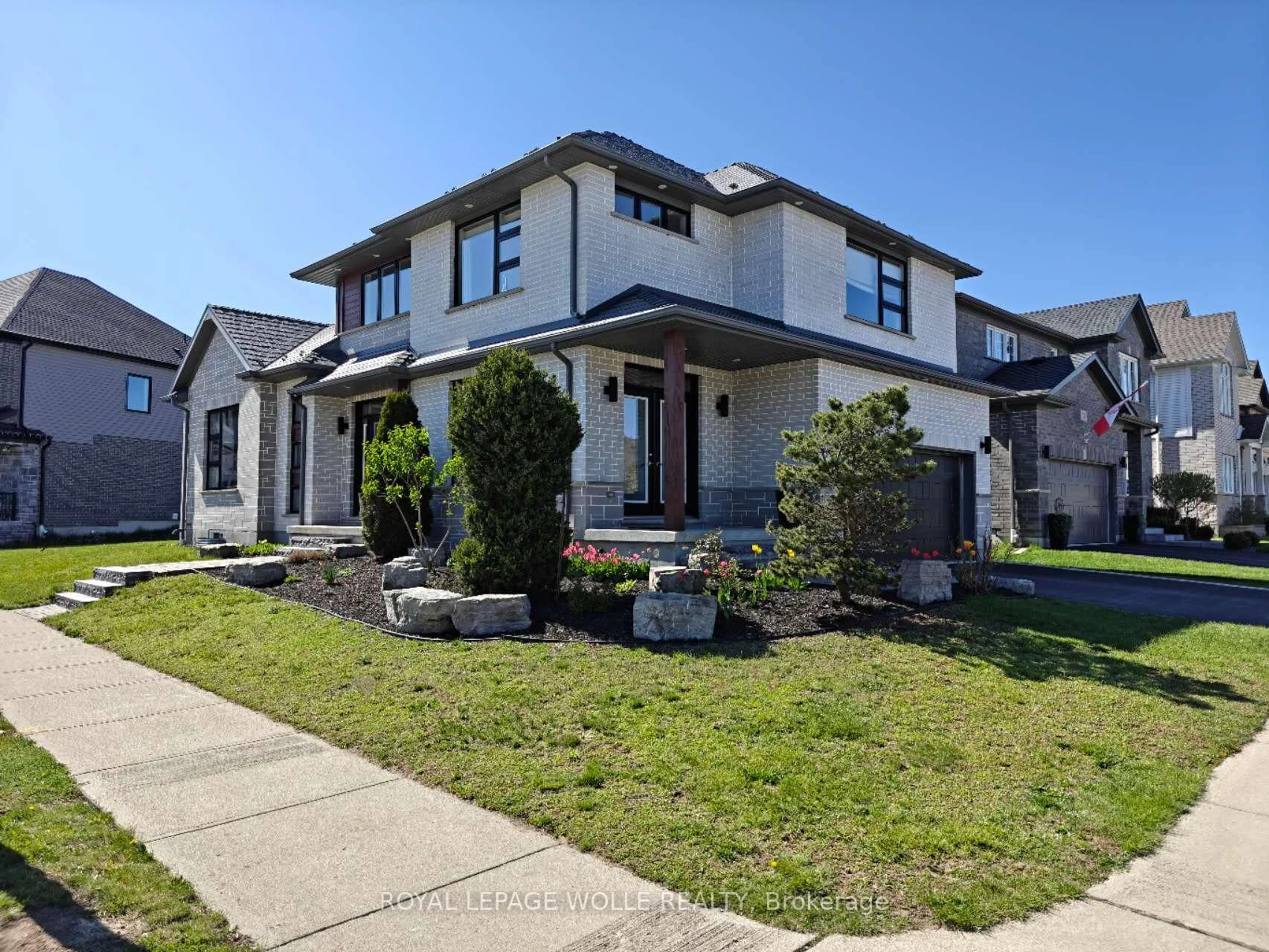 Home with brick exterior material, street for 69 Eaglecrest St, Kitchener Ontario N2K 0B8
