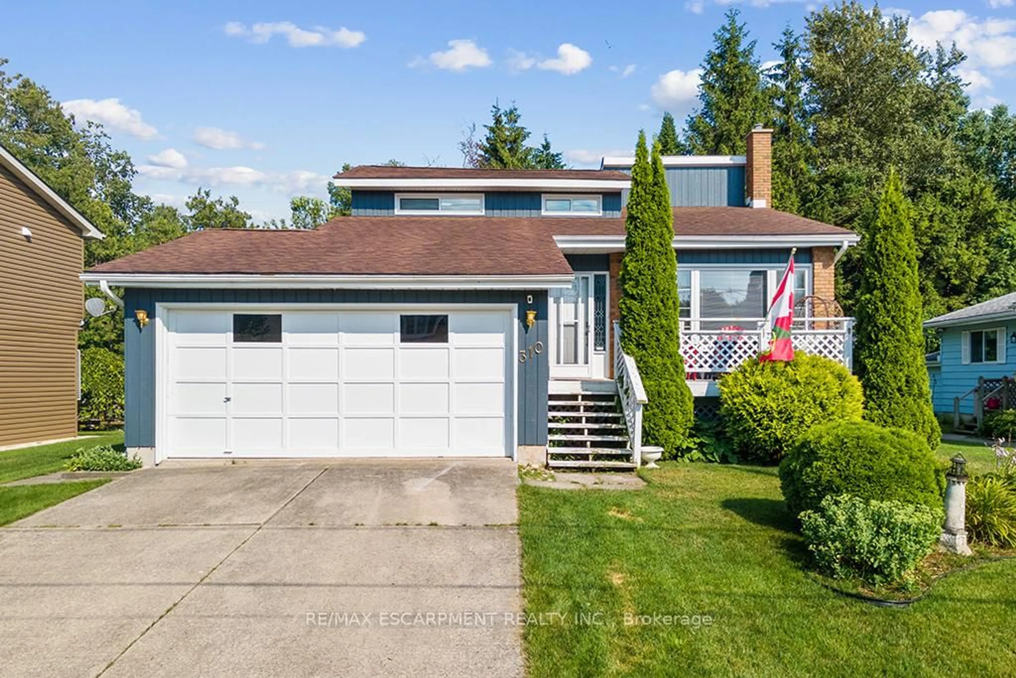 Home with vinyl exterior material, street for 310 Albert St, Saugeen Shores Ontario N0H 2L0
