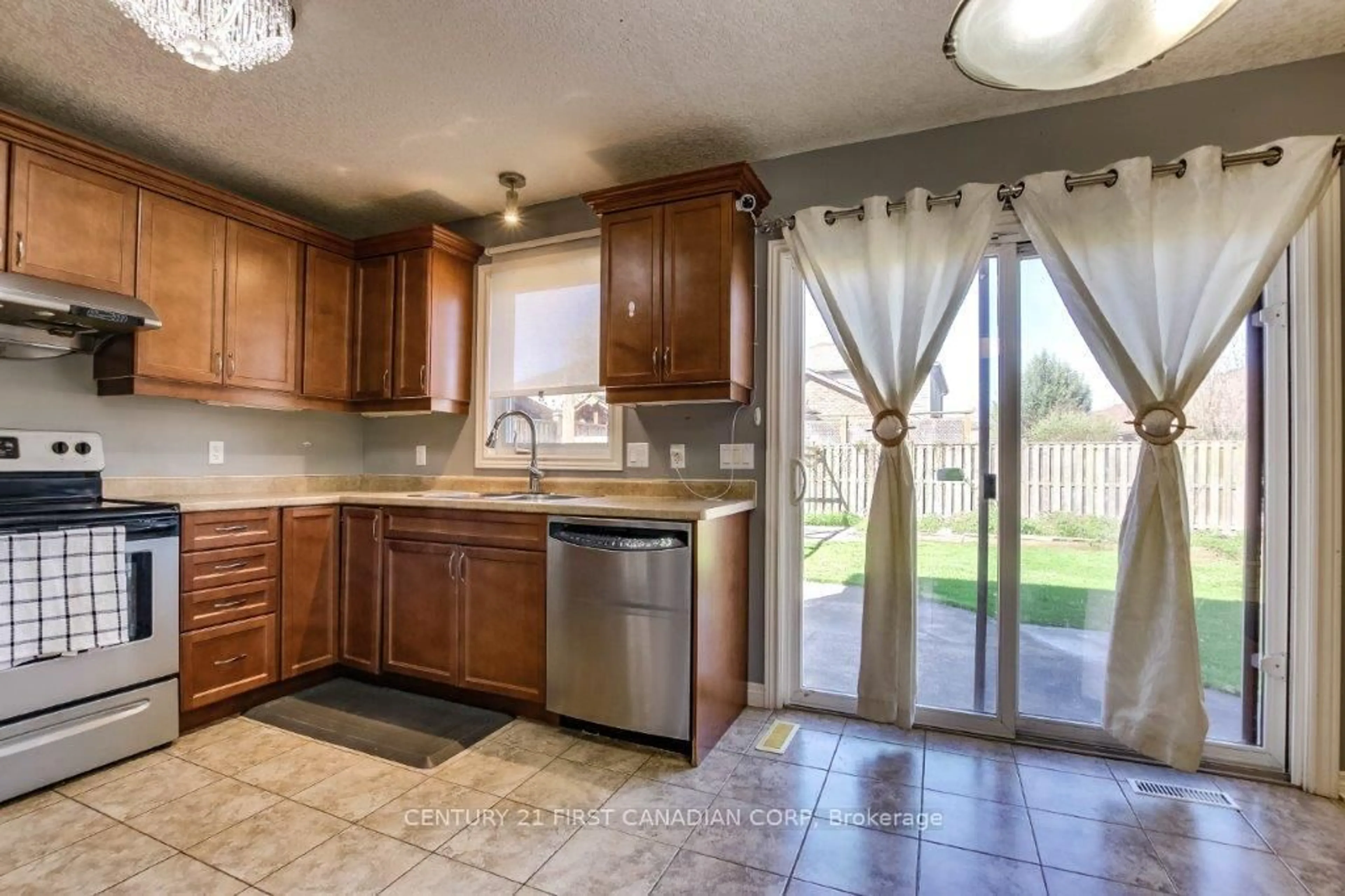 Open concept kitchen, ceramic/tile floor for 1678 BLACKMAPLE Cres, London East Ontario N5Y 6L6