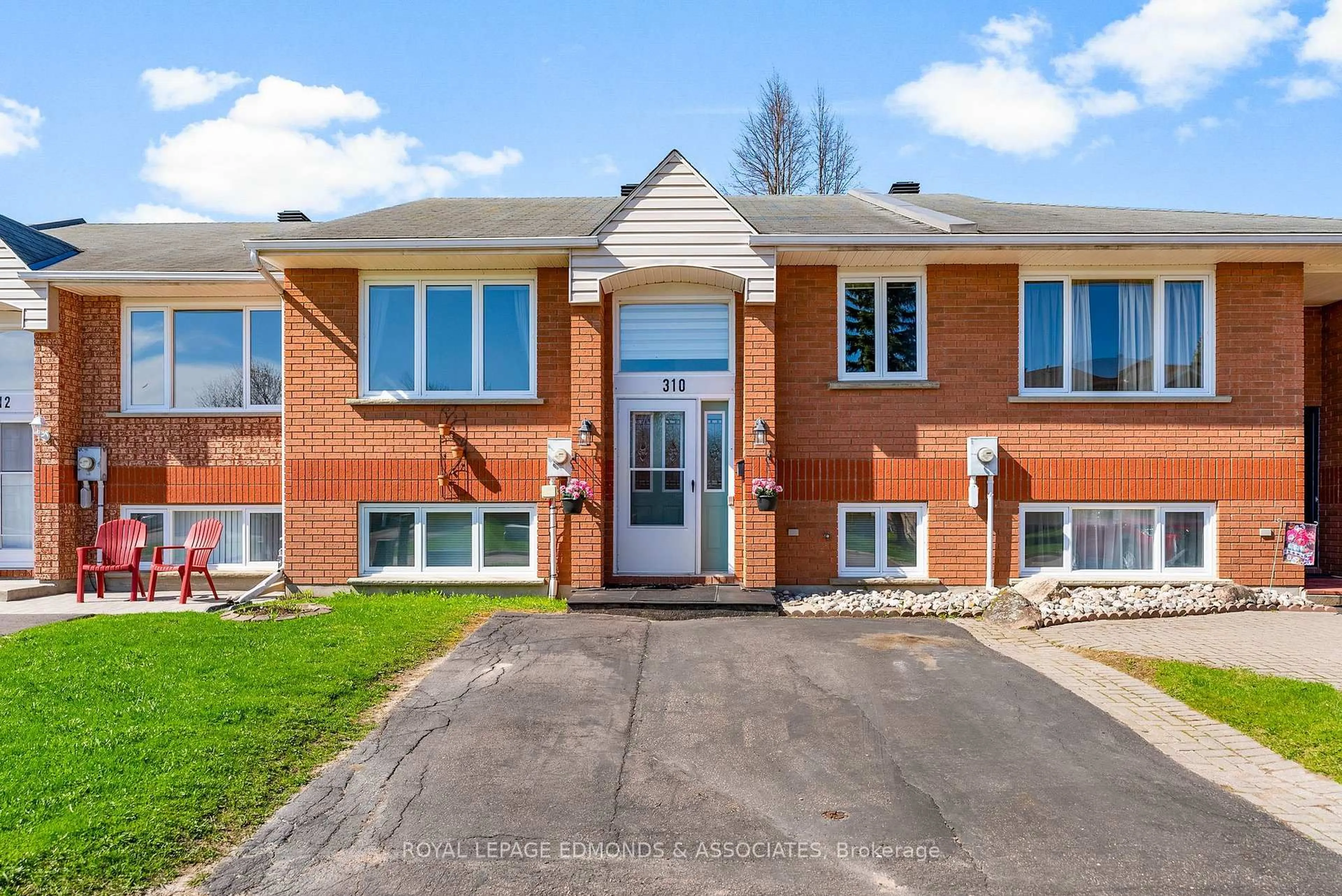 Home with brick exterior material, street for 310 Matheson Dr, Pembroke Ontario K8A 8M2