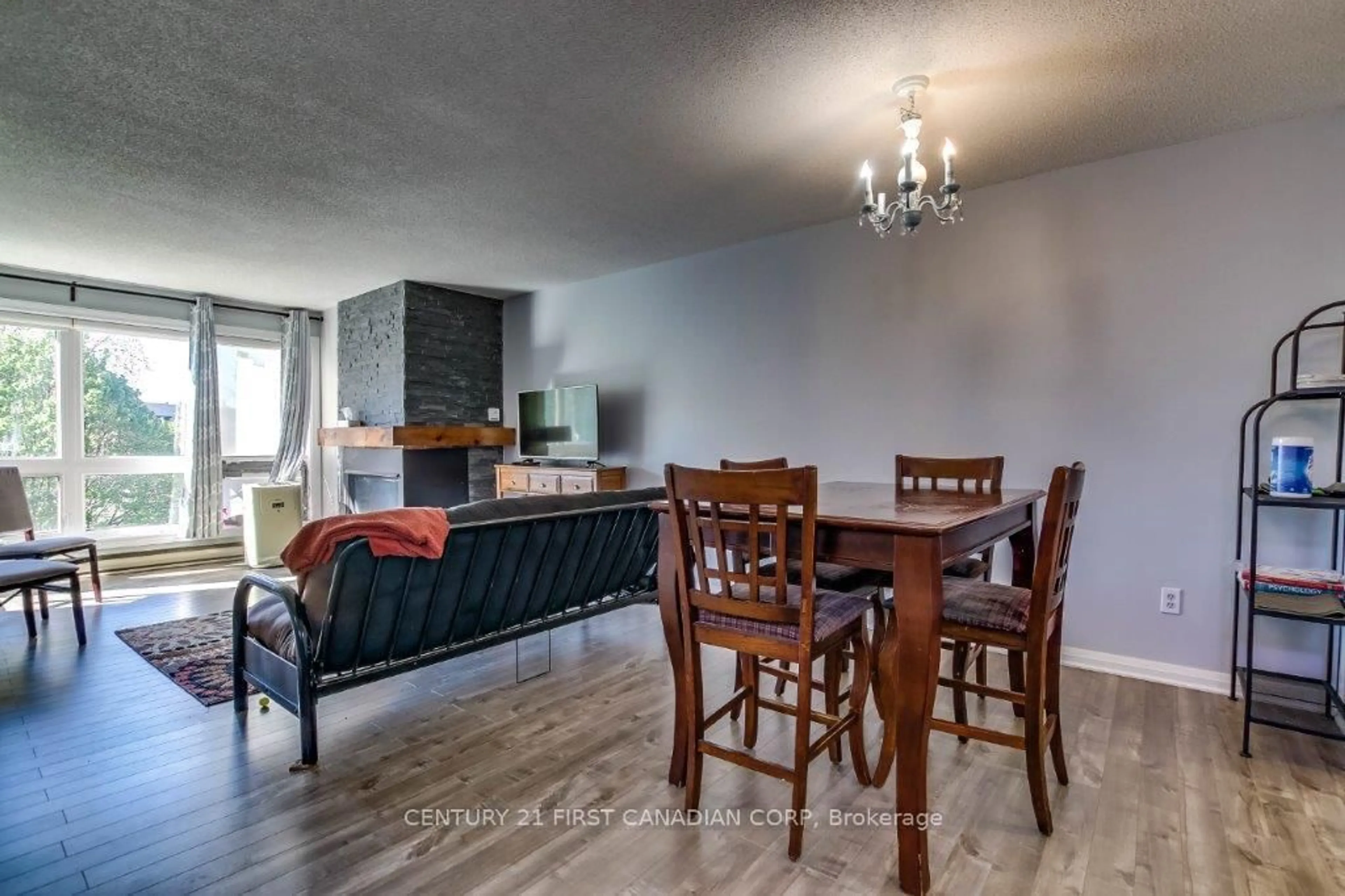 Dining room, wood/laminate floor for 5 Jacksway Cres #317, London North Ontario N5X 3T6