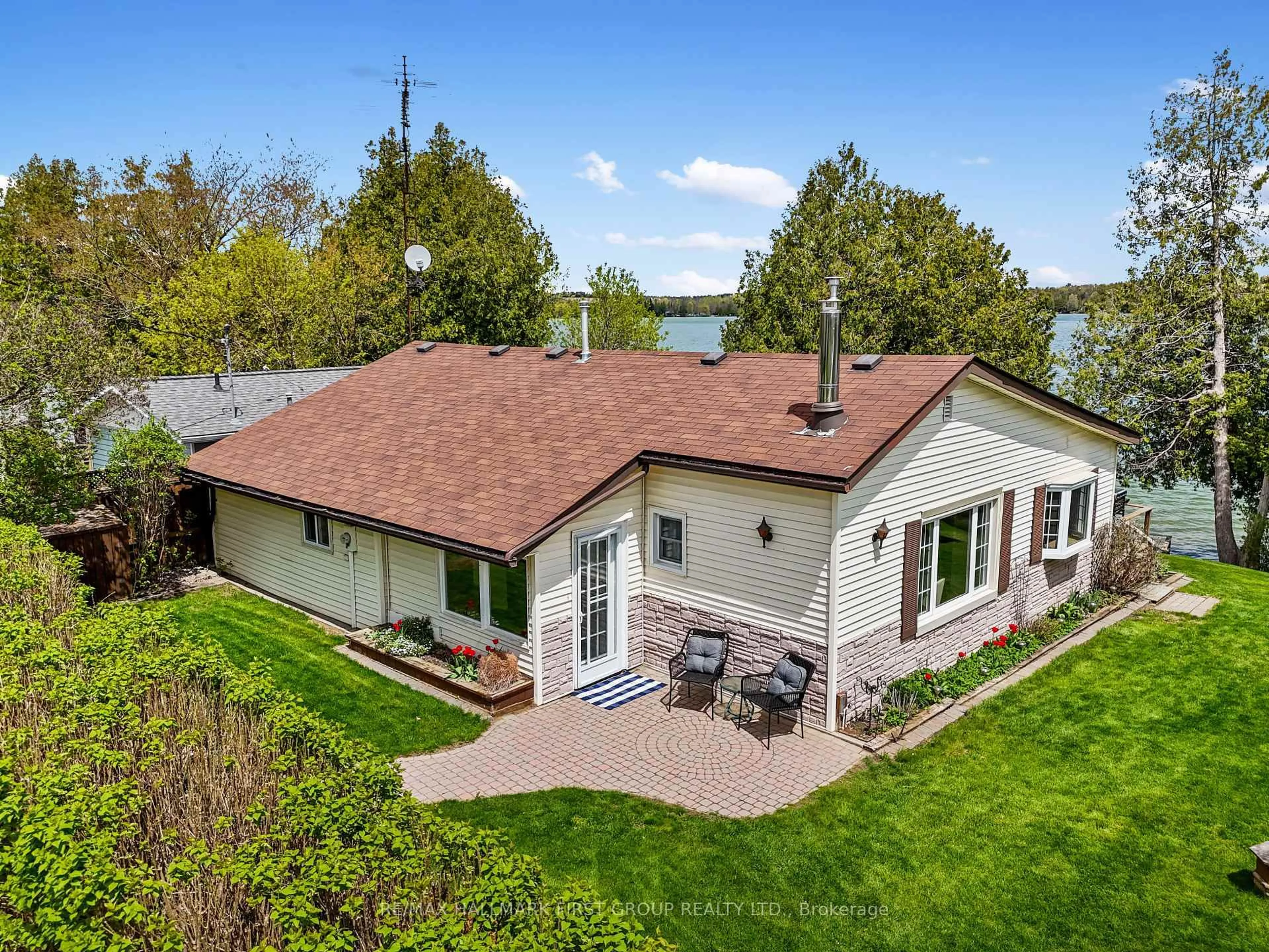 A pic from outside/outdoor area/front of a property/back of a property/a pic from drone, water/lake/river/ocean view for 183 Lake Rd, Cramahe Ontario K0K 1S0
