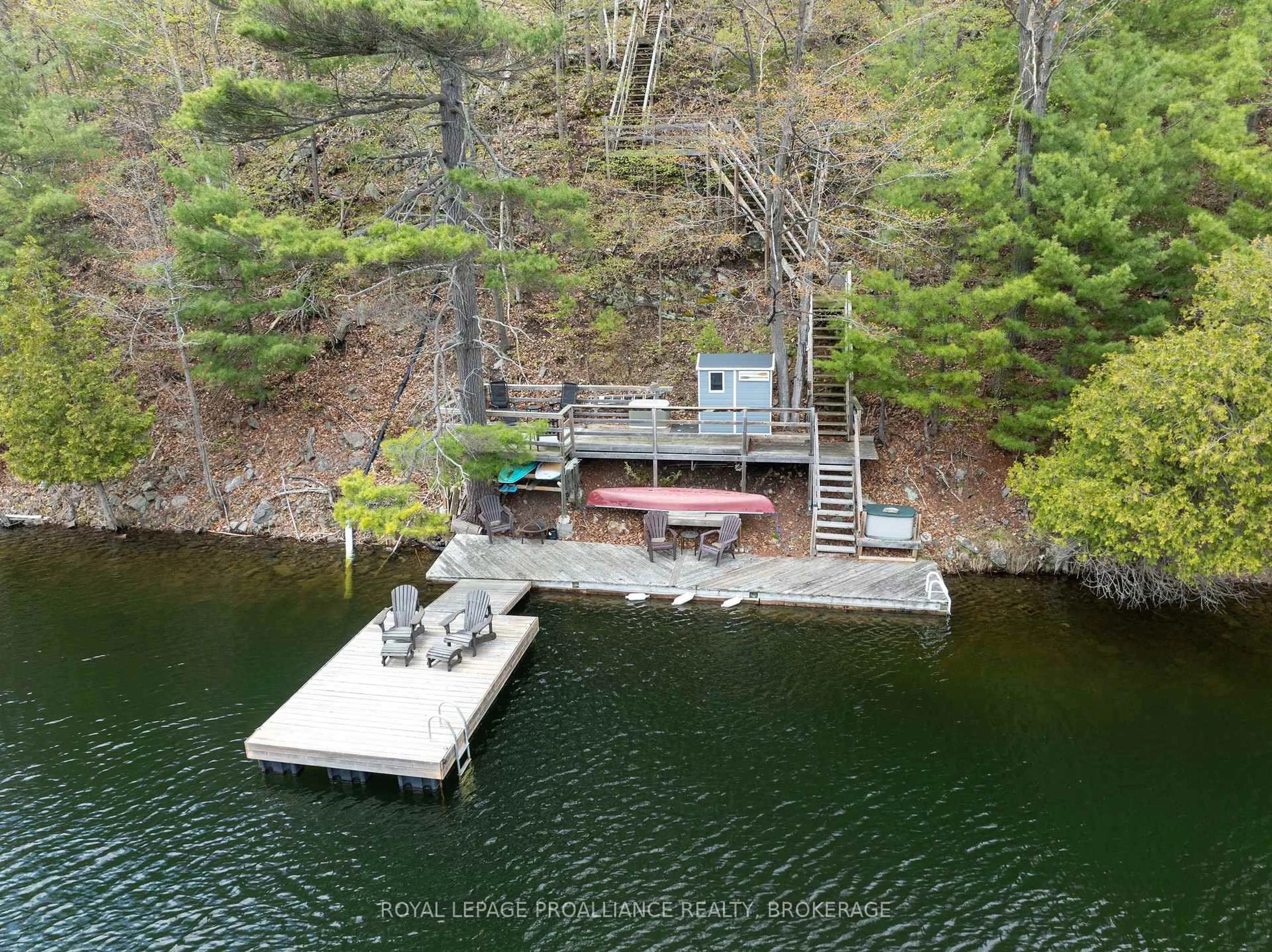 A pic from outside/outdoor area/front of a property/back of a property/a pic from drone, water/lake/river/ocean view for 169 Seapoint Lane, Westport Ontario K0G 1X0