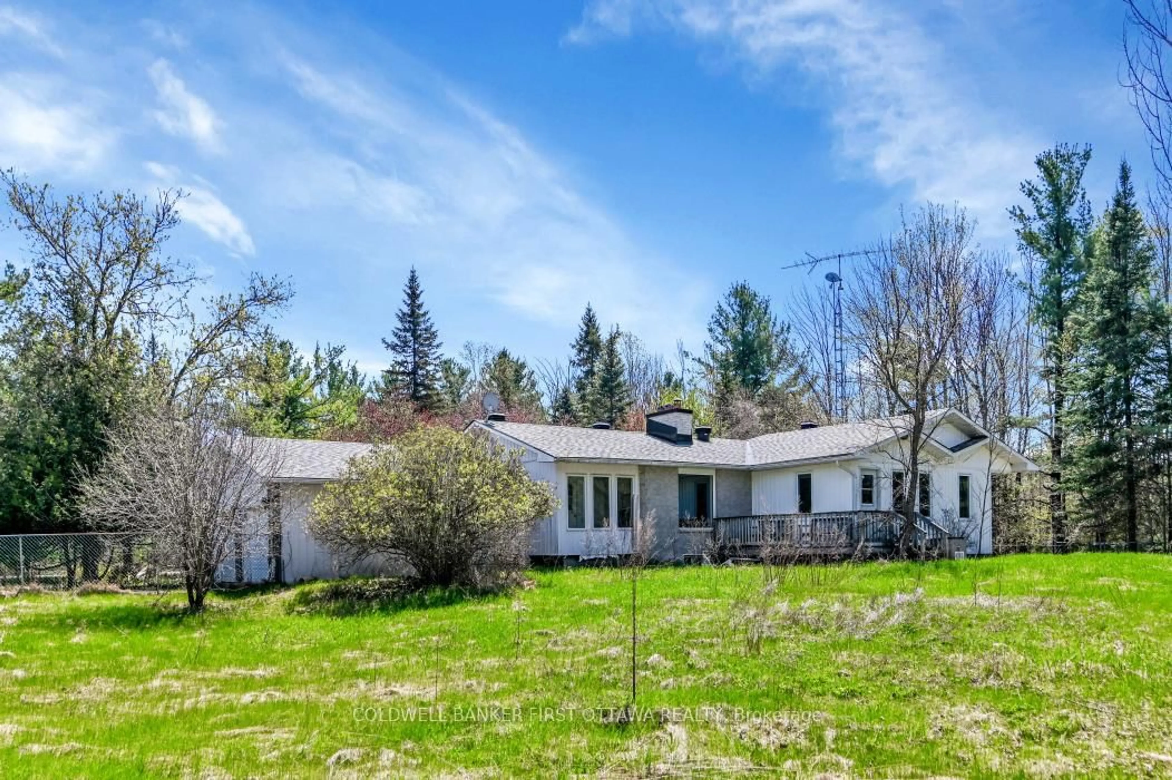 A pic from outside/outdoor area/front of a property/back of a property/a pic from drone, unknown for 135 Manion Rd, Carp Ontario K0A 1L0