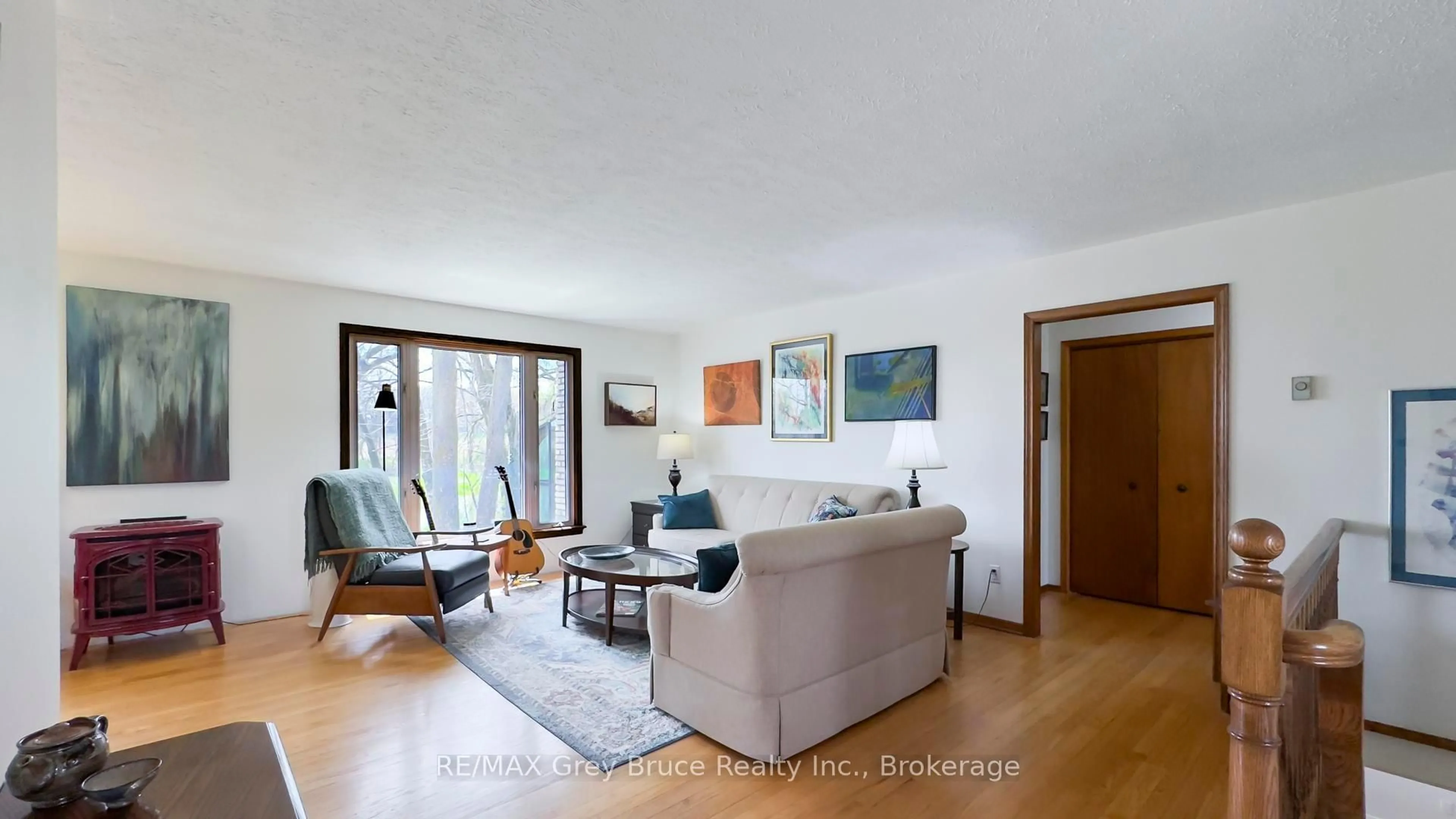 Living room with furniture, wood/laminate floor for 229 6th Concession, Arran-Elderslie Ontario N0H 2N0