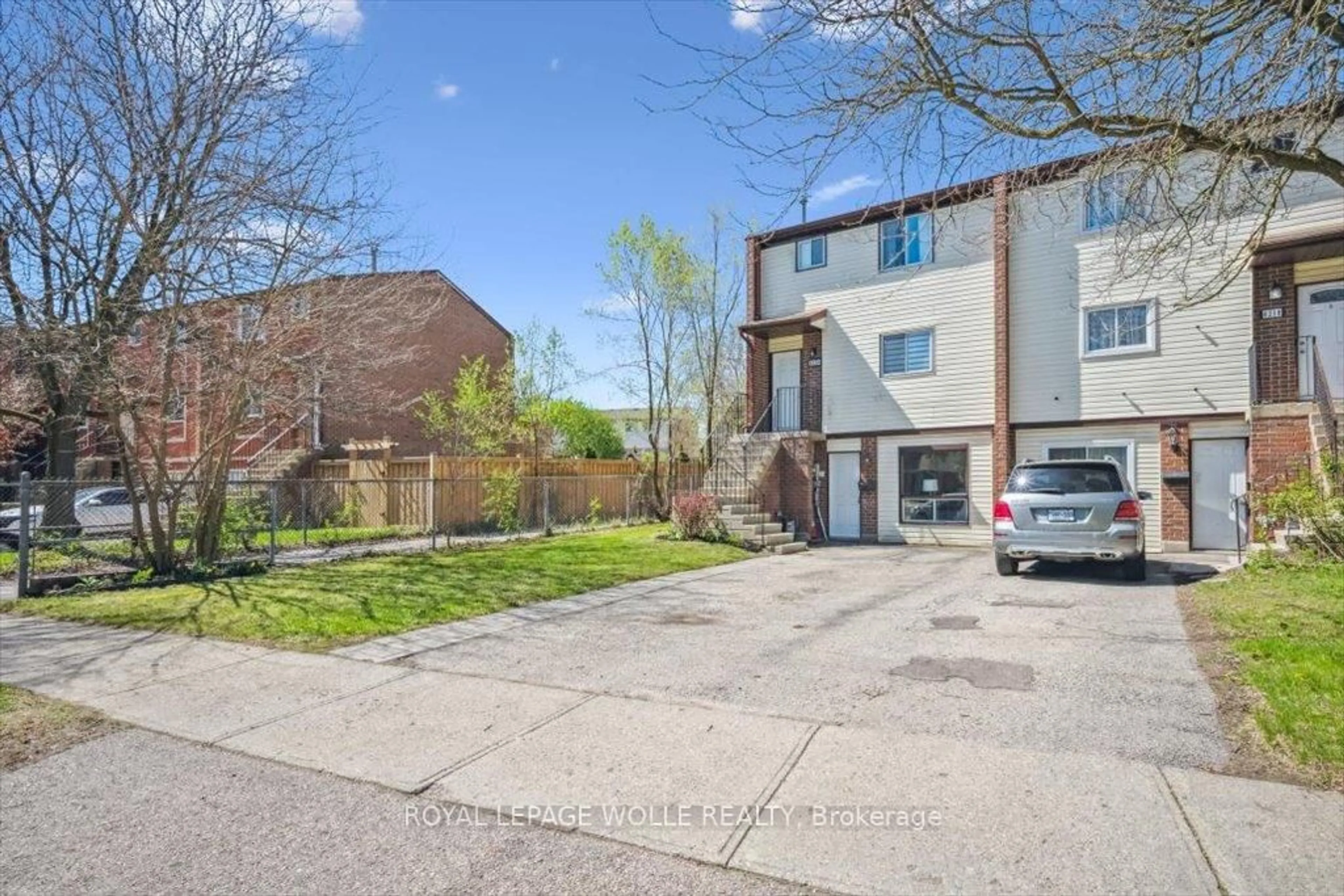 A pic from outside/outdoor area/front of a property/back of a property/a pic from drone, street for 421 Bairstow Cres #A, Waterloo Ontario N2K 2H7