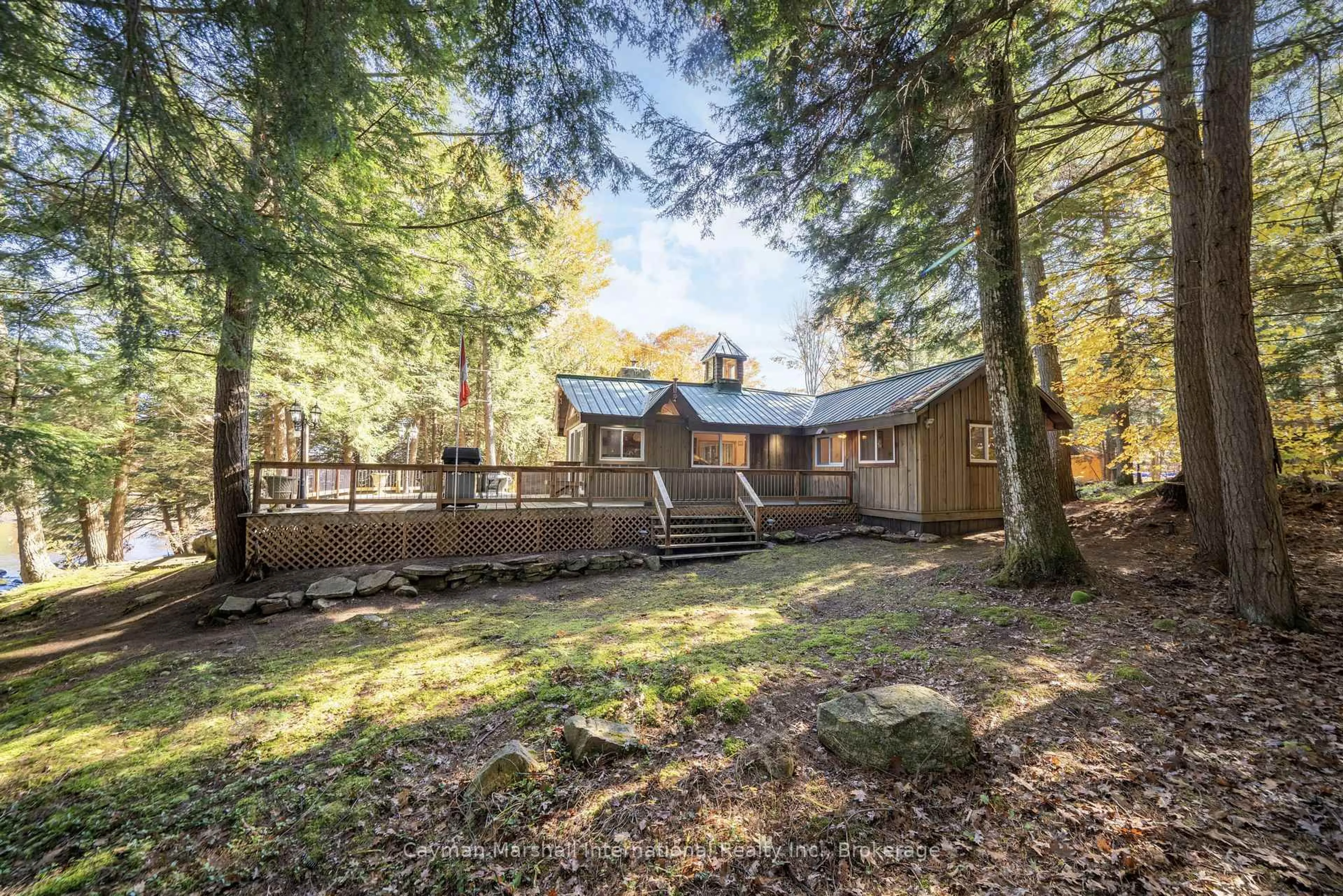 A pic from outside/outdoor area/front of a property/back of a property/a pic from drone, forest/trees view for 1043 Quiet Place Lane, Algonquin Highlands Ontario K0M 2K0