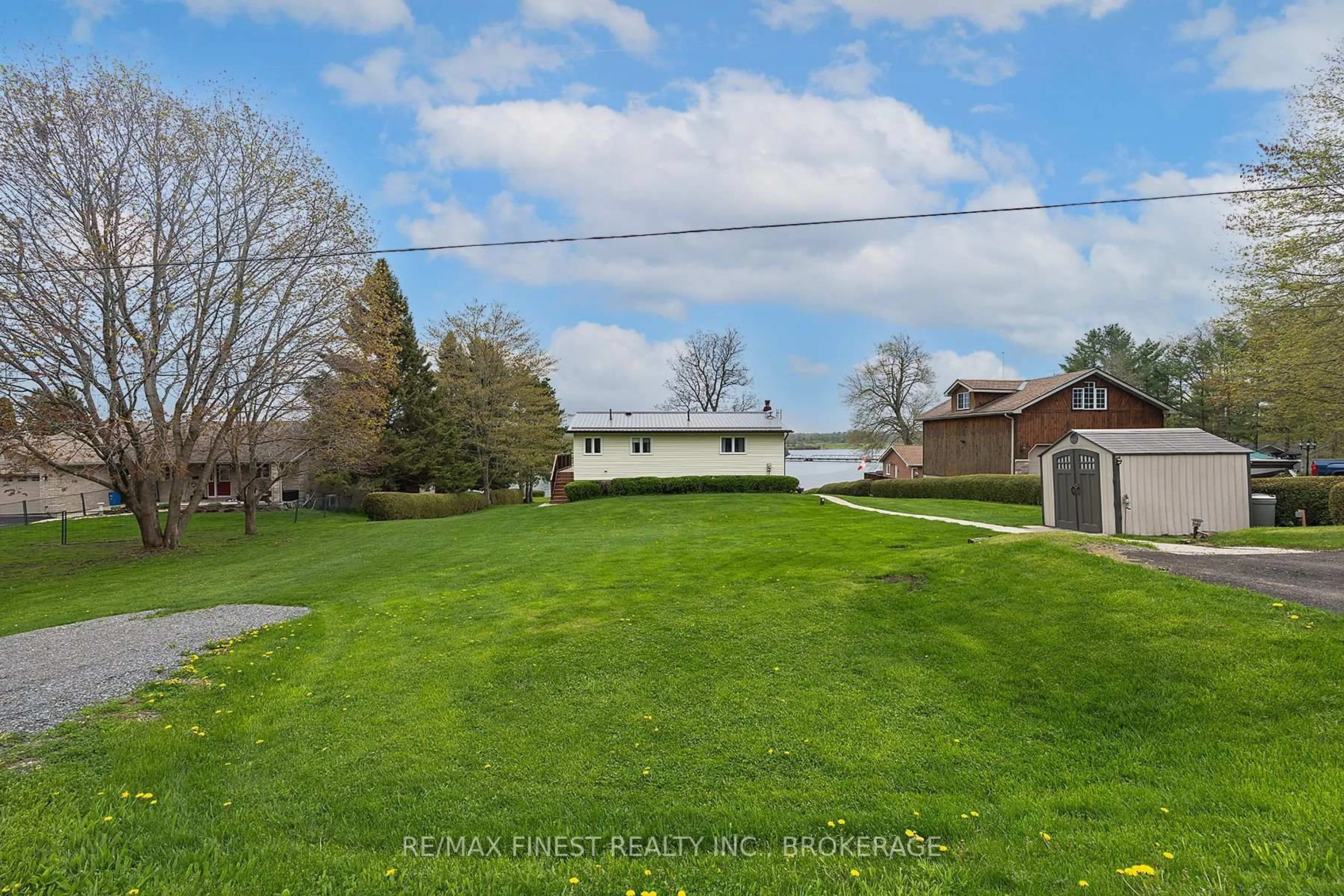 A pic from outside/outdoor area/front of a property/back of a property/a pic from drone, water/lake/river/ocean view for 5352 RIDEAU Rd, Seeley's Bay Ontario K0H 2N0