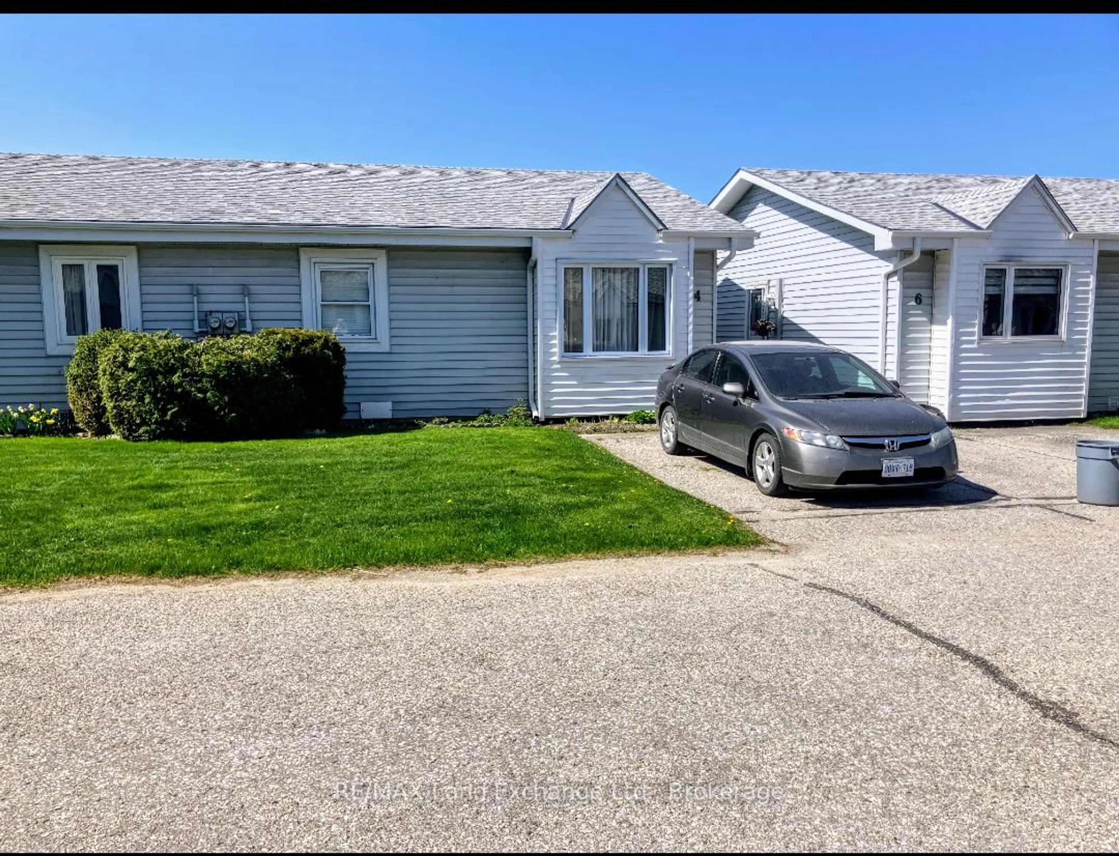 A pic from outside/outdoor area/front of a property/back of a property/a pic from drone, street for 303 Waterloo St #4, Saugeen Shores Ontario N0H 2C1