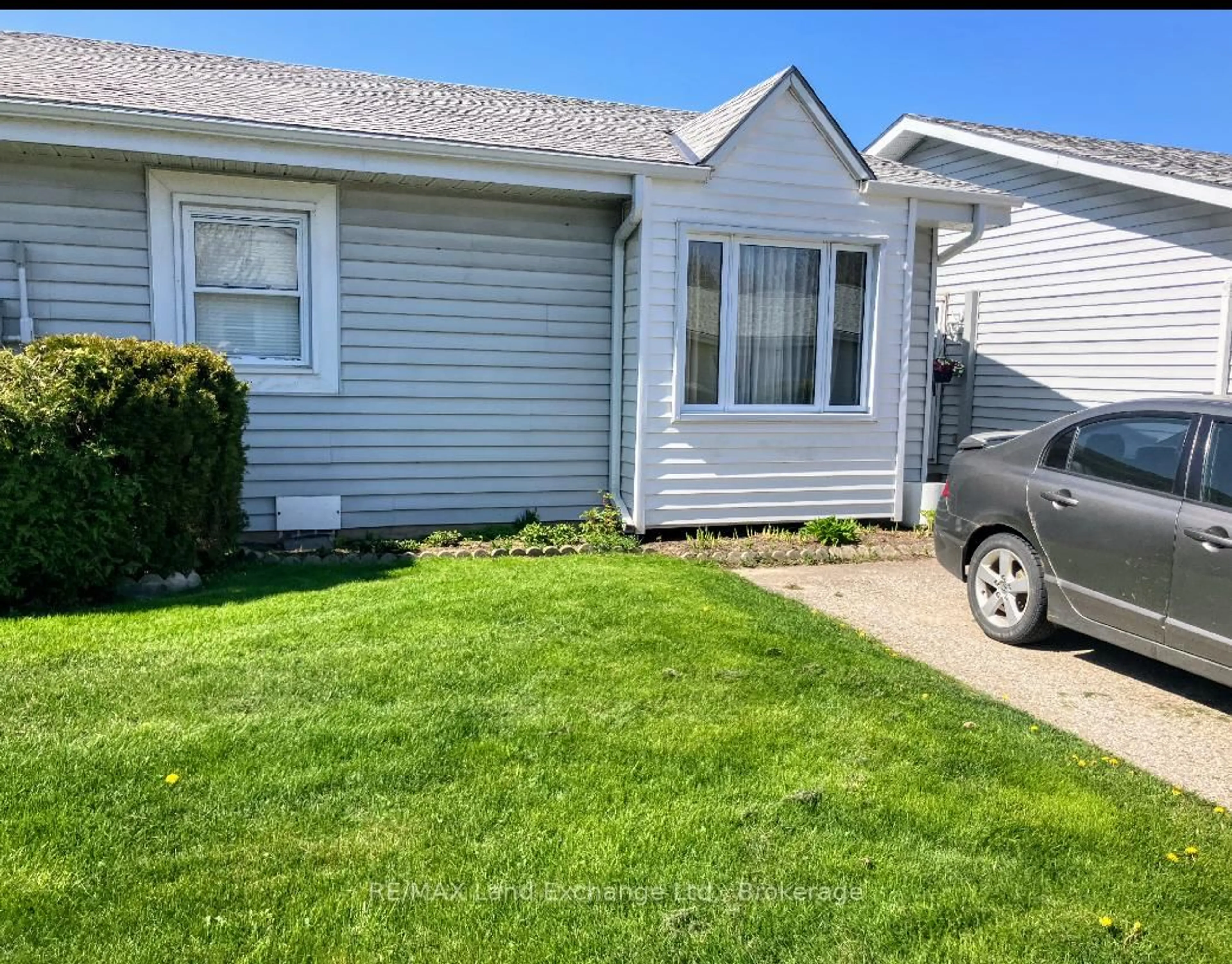 Home with vinyl exterior material, street for 303 Waterloo St #4, Saugeen Shores Ontario N0H 2C1