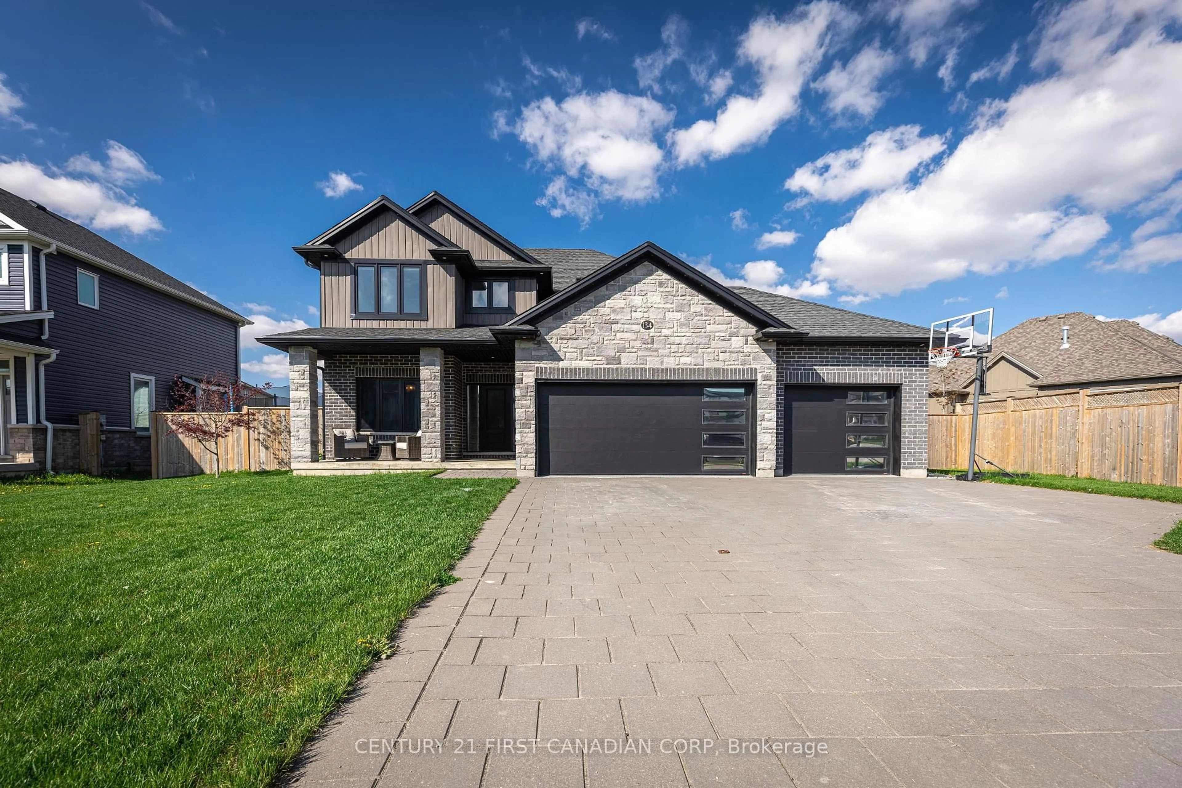 Home with brick exterior material, street for 134 Spencer Ave, Lucan Biddulph Ontario N0M 2J0