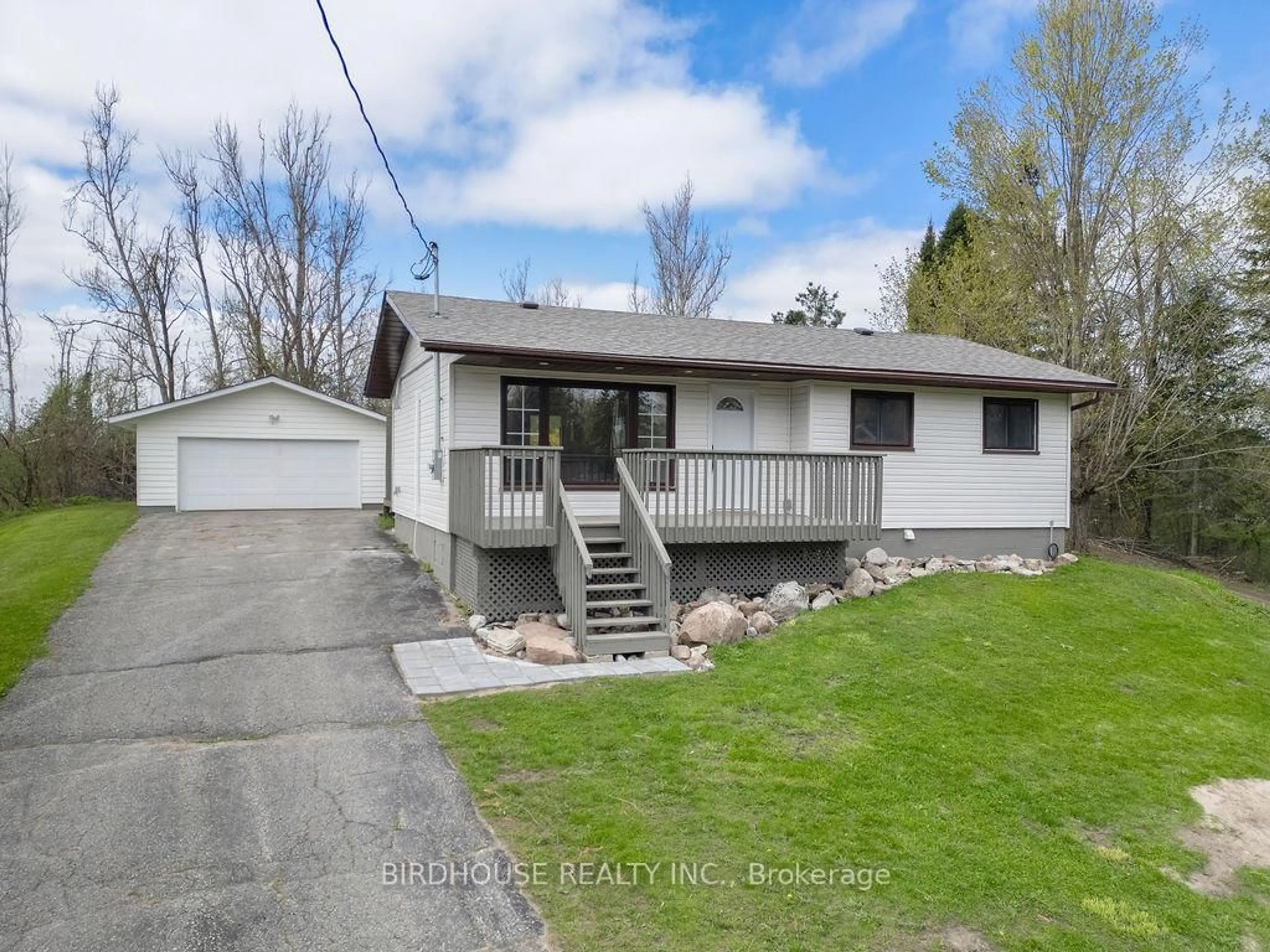 Home with vinyl exterior material, street for 10 Cedar Cres, Galway-Cavendish and Harvey Ontario K0M 1A0