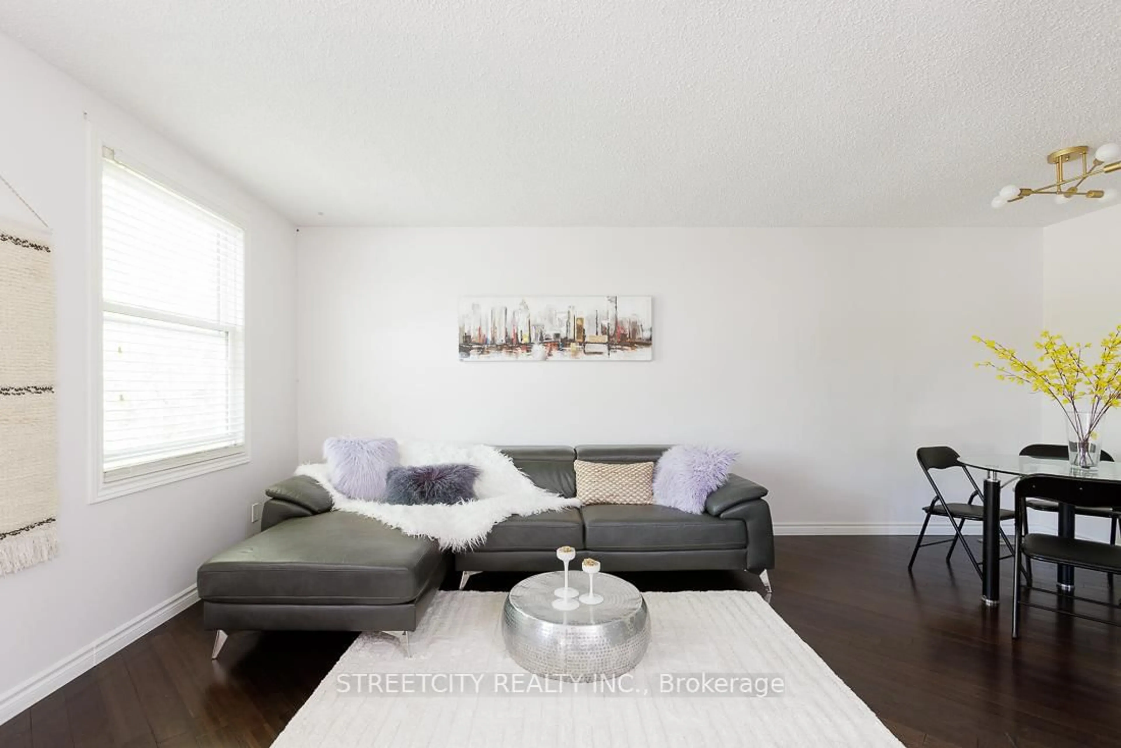 Living room with furniture, wood/laminate floor for 112 ARDSLEY Cres, London North Ontario N6G 3W7