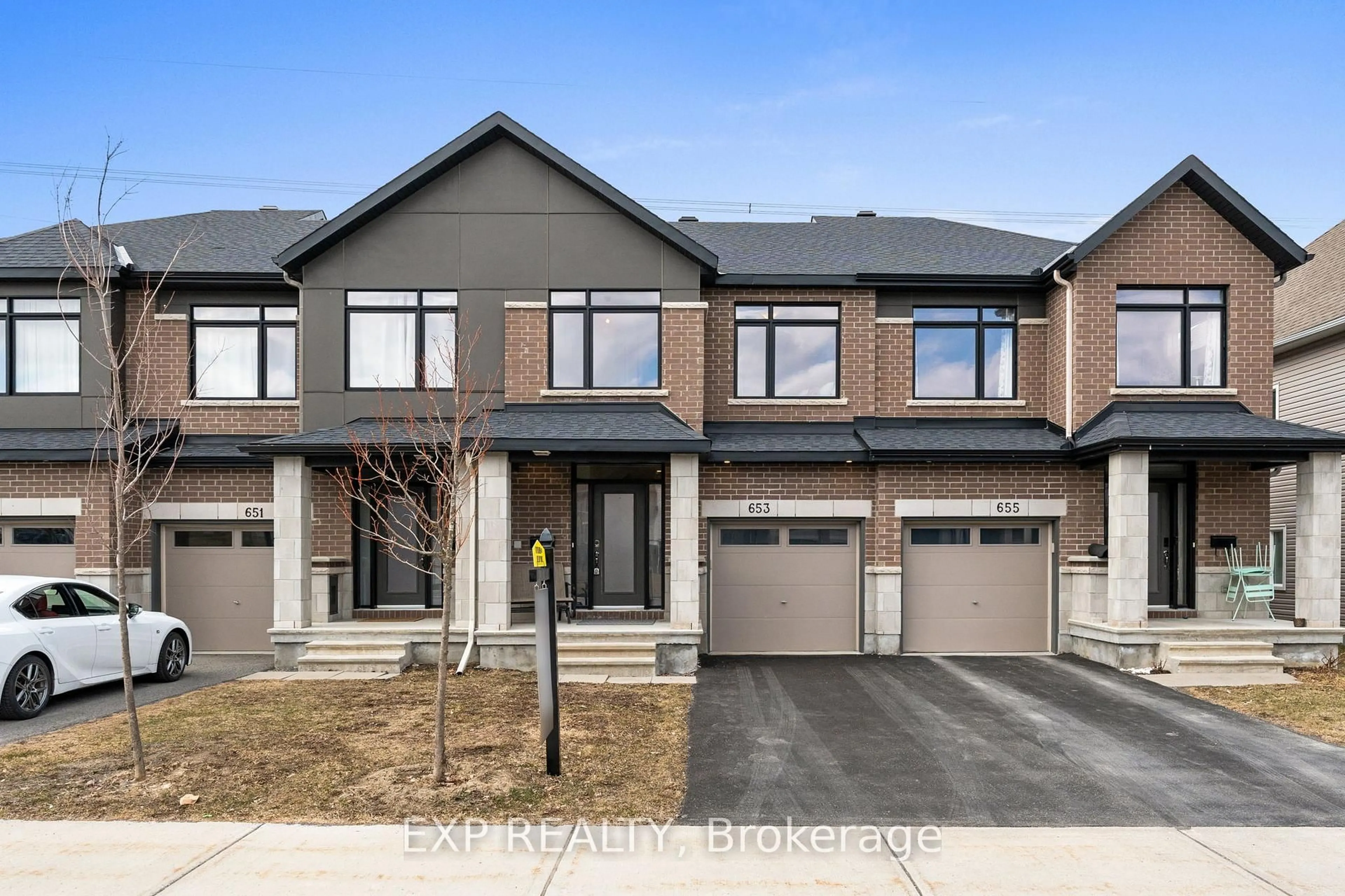 Home with brick exterior material, street for 653 Putney Cres, Ottawa Ontario K2S 2N7