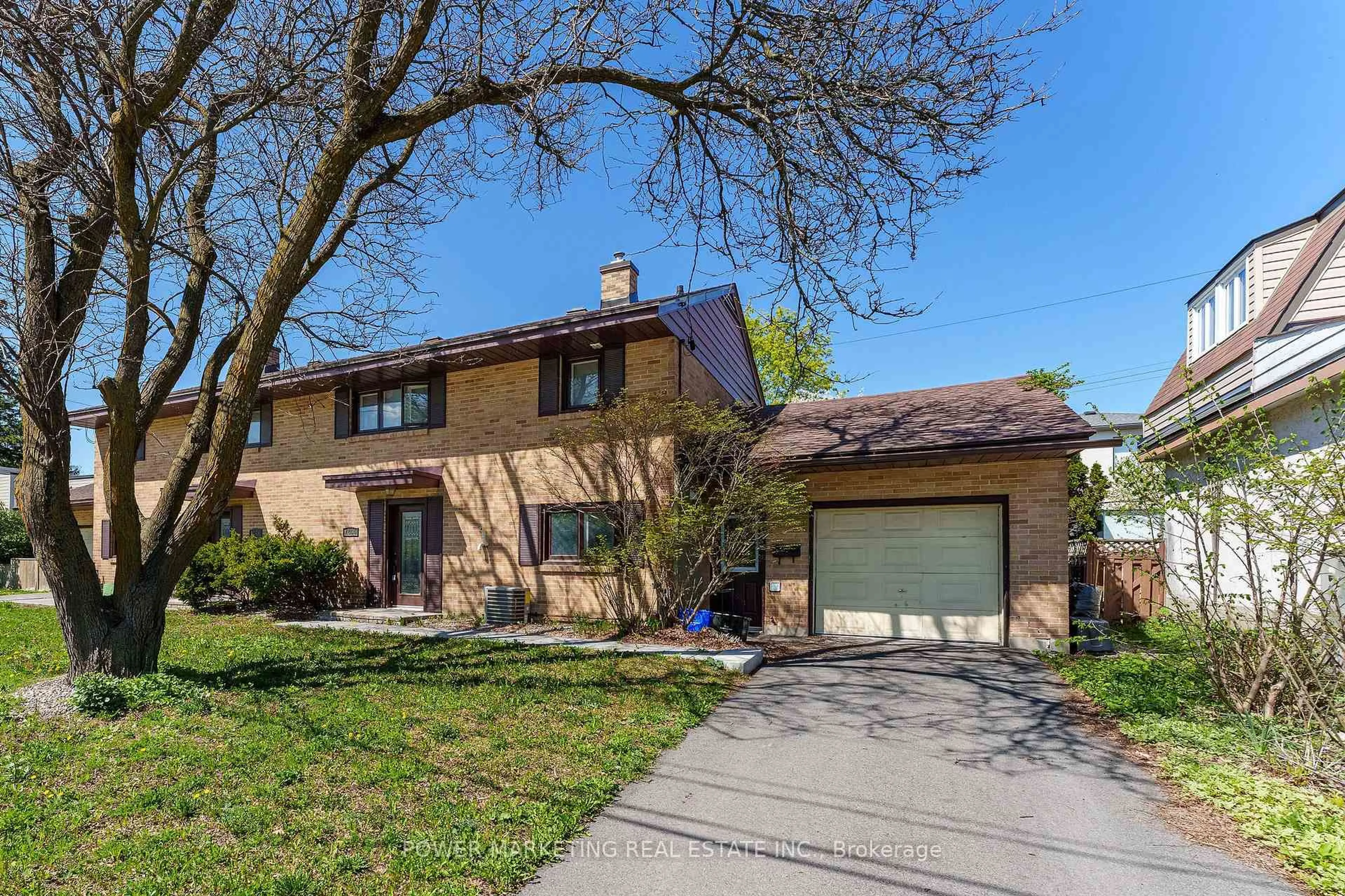 Home with brick exterior material, street for 1244 PRINCE OF WALES Dr, Ottawa Ontario K2C 1M9