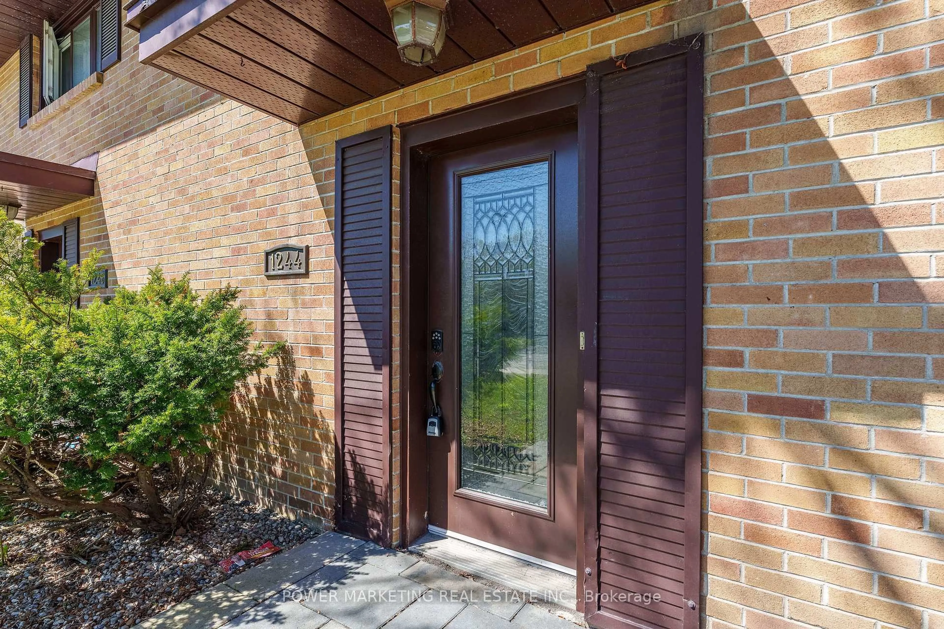 Home with brick exterior material, street for 1244 PRINCE OF WALES Dr, Ottawa Ontario K2C 1M9