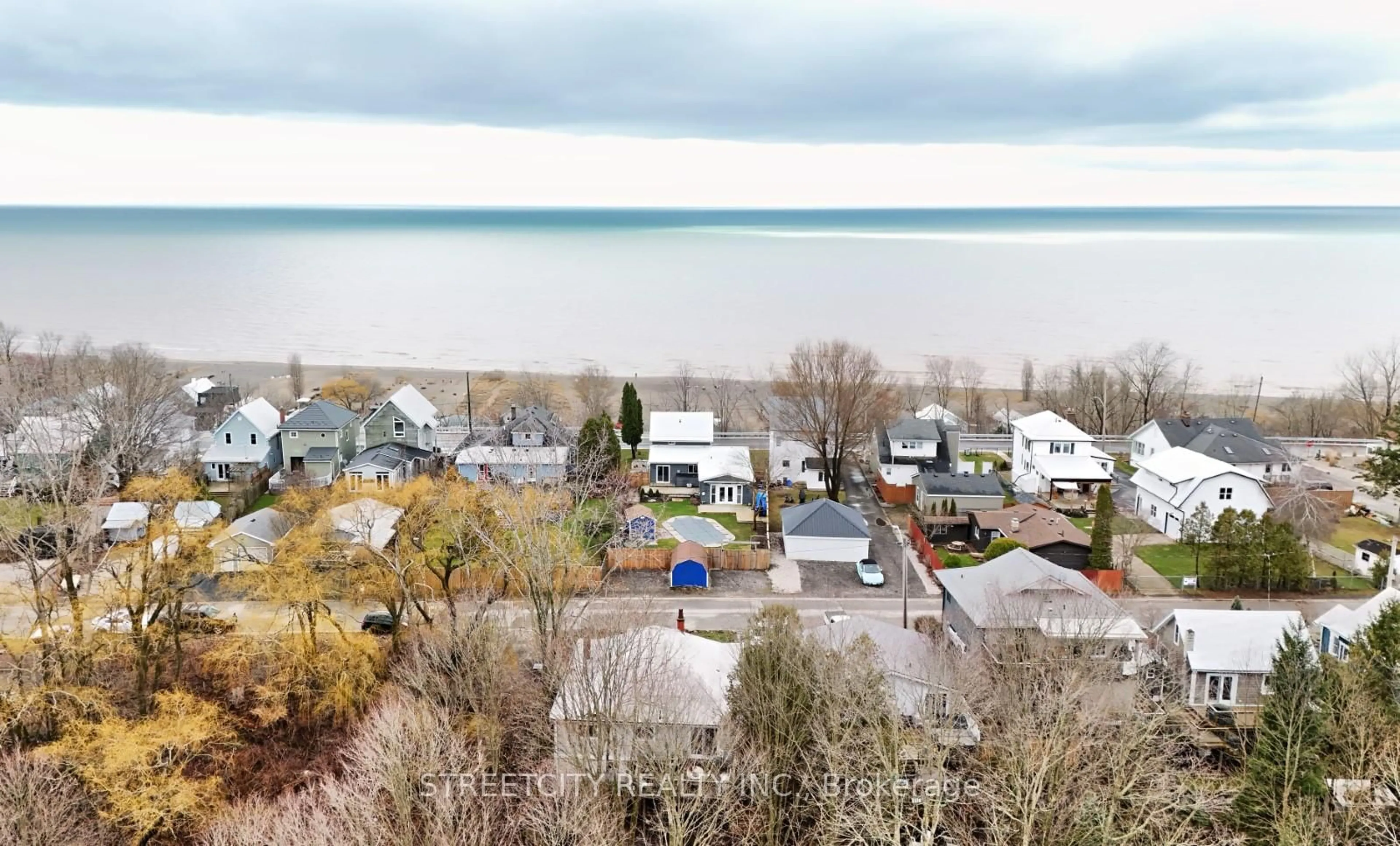 A pic from outside/outdoor area/front of a property/back of a property/a pic from drone, water/lake/river/ocean view for 417 Tower Heights Dr, Central Elgin Ontario N5L 1G3