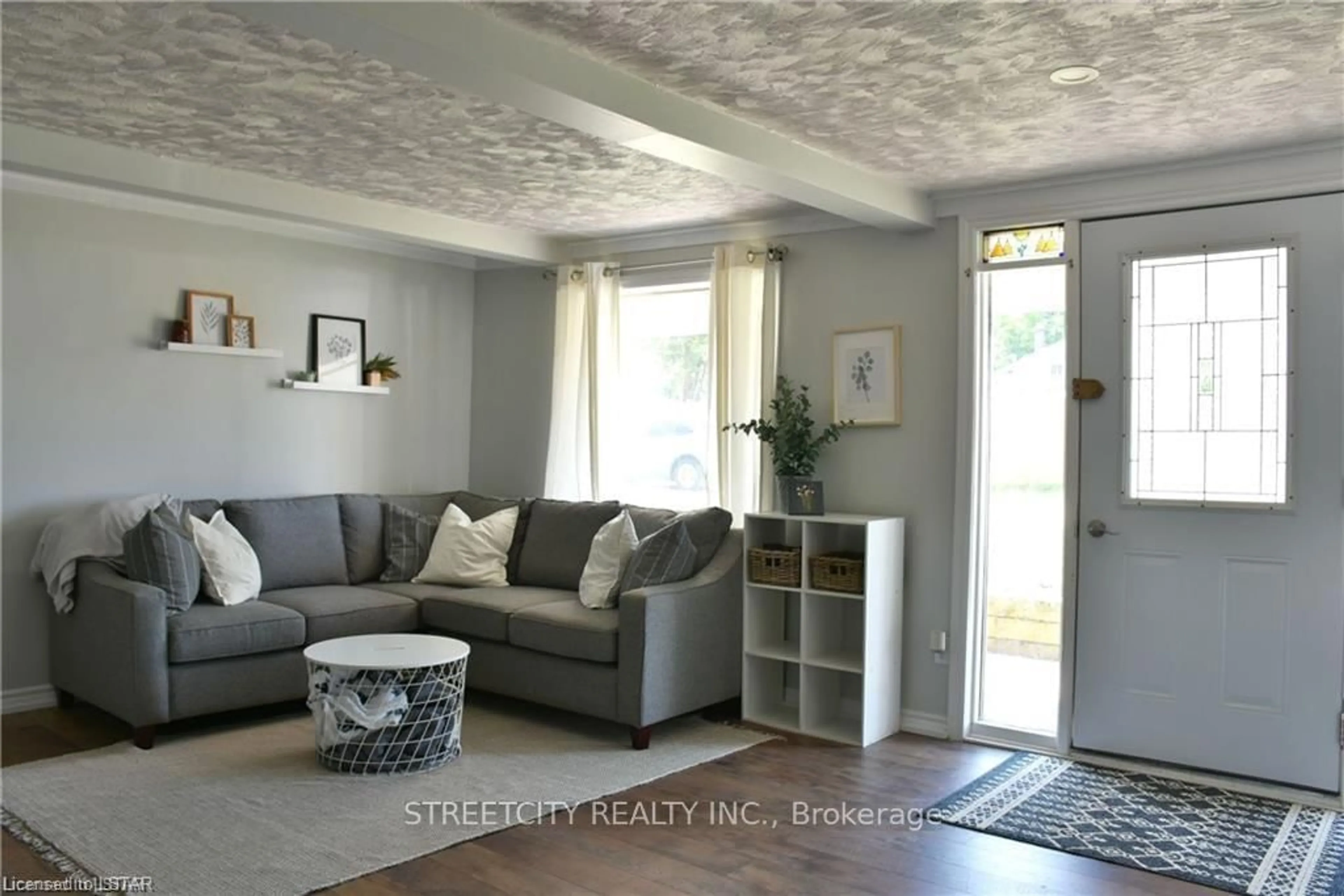 Living room with furniture, cement floor for 417 Tower Heights Dr, Central Elgin Ontario N5L 1G3