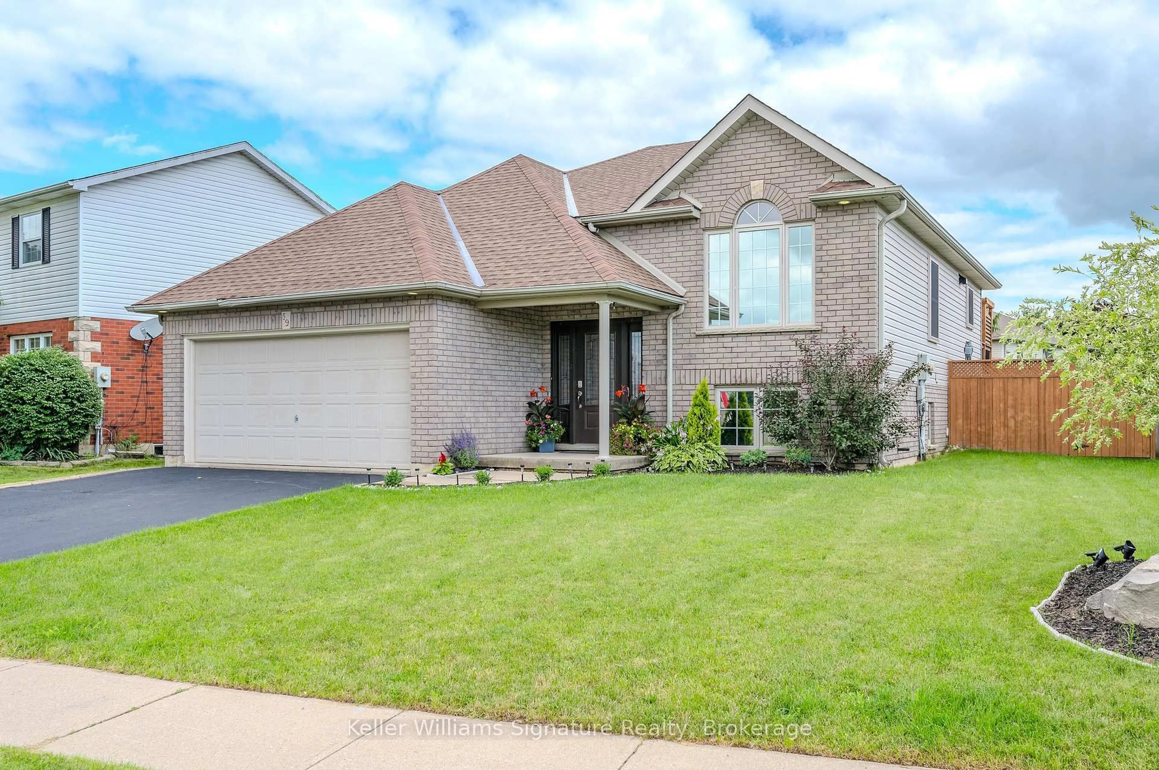 Home with brick exterior material, street for 59 Whitlaw Way, Brant Ontario N3L 4B3