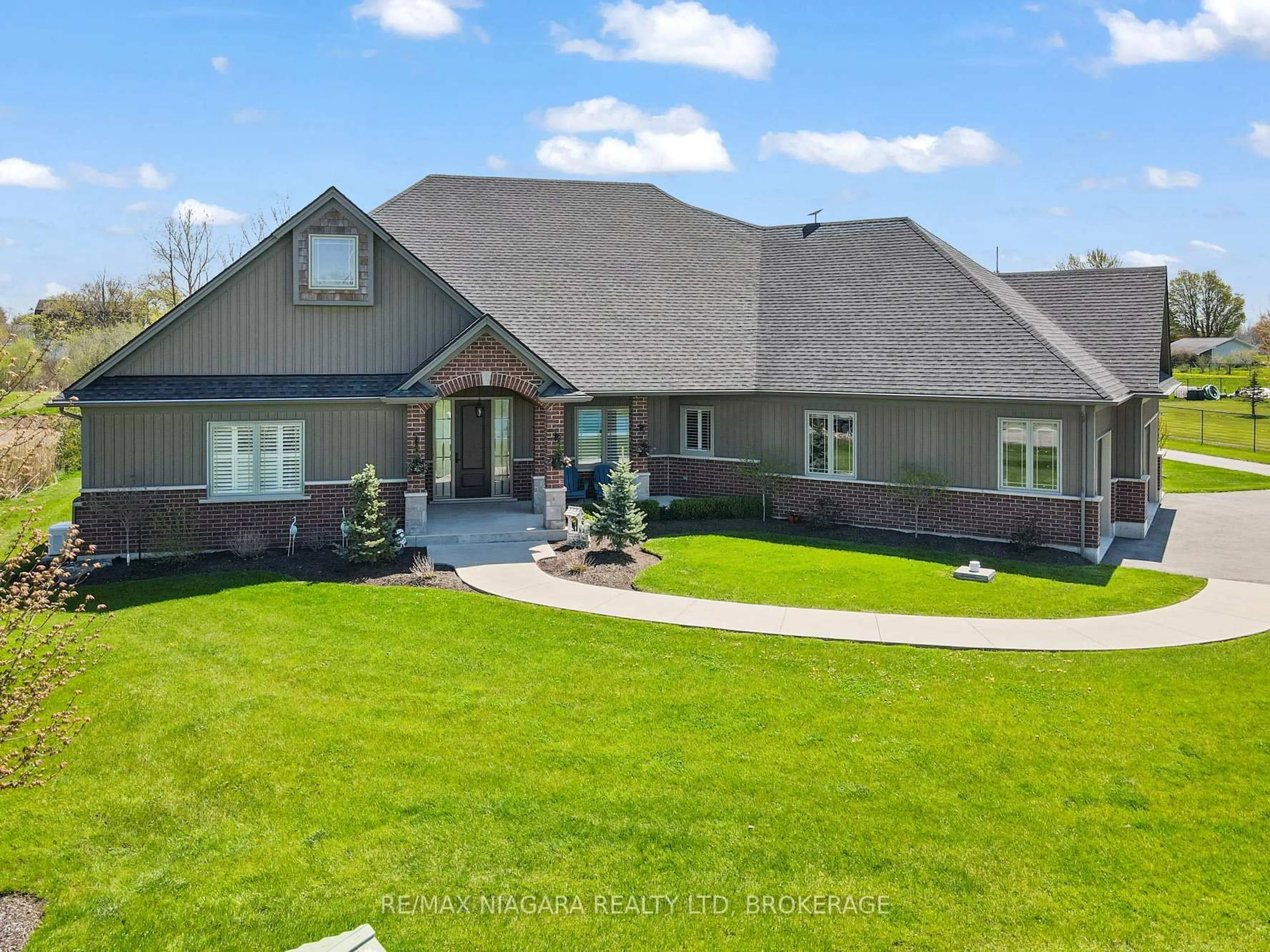 A pic from outside/outdoor area/front of a property/back of a property/a pic from drone, mountain view for 20227 Youngs Rd, Wainfleet Ontario L3K 5V4