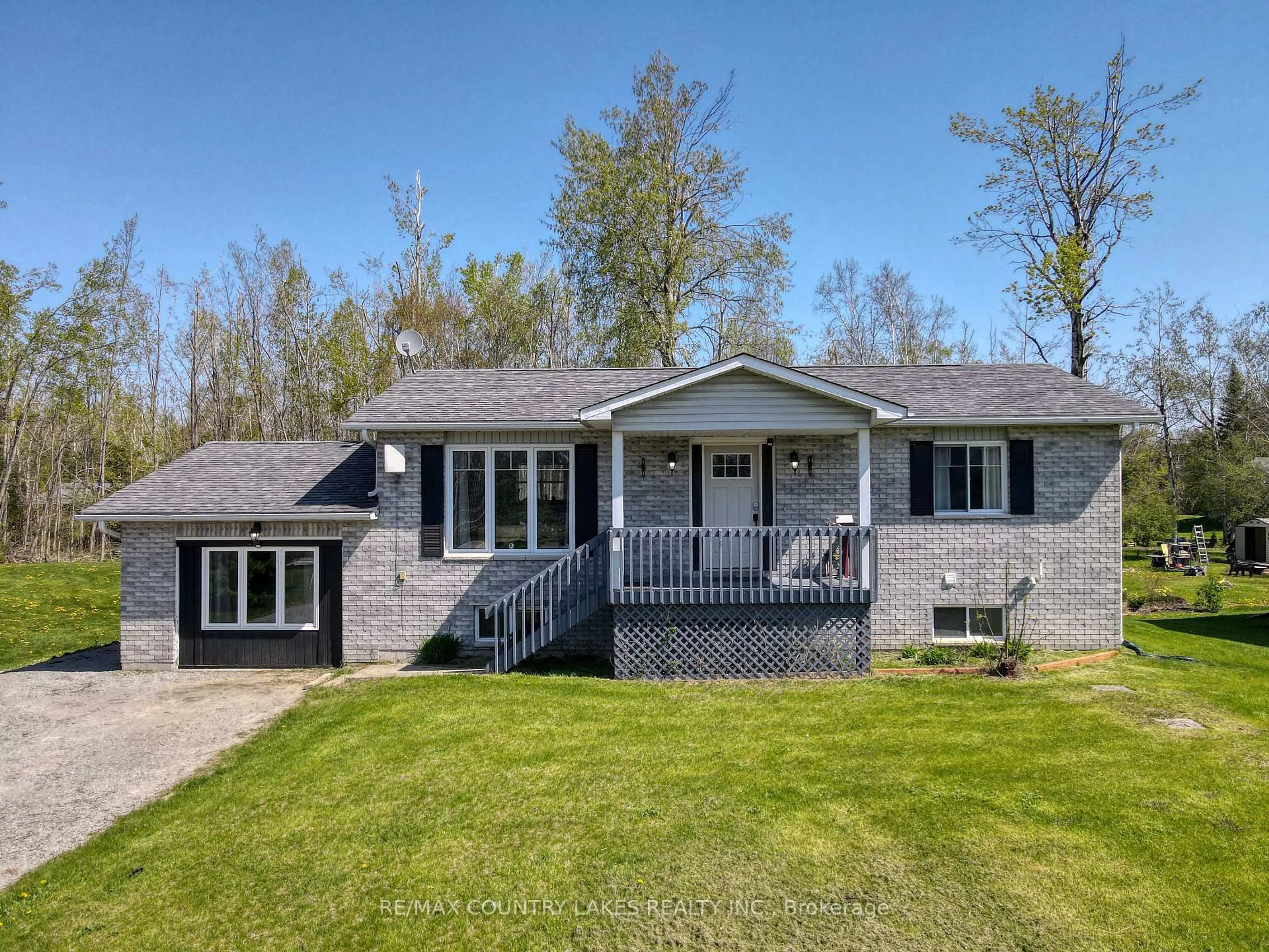 A pic from outside/outdoor area/front of a property/back of a property/a pic from drone, street for 40 Greenwood Cres, Kawartha Lakes Ontario K0M 2T0