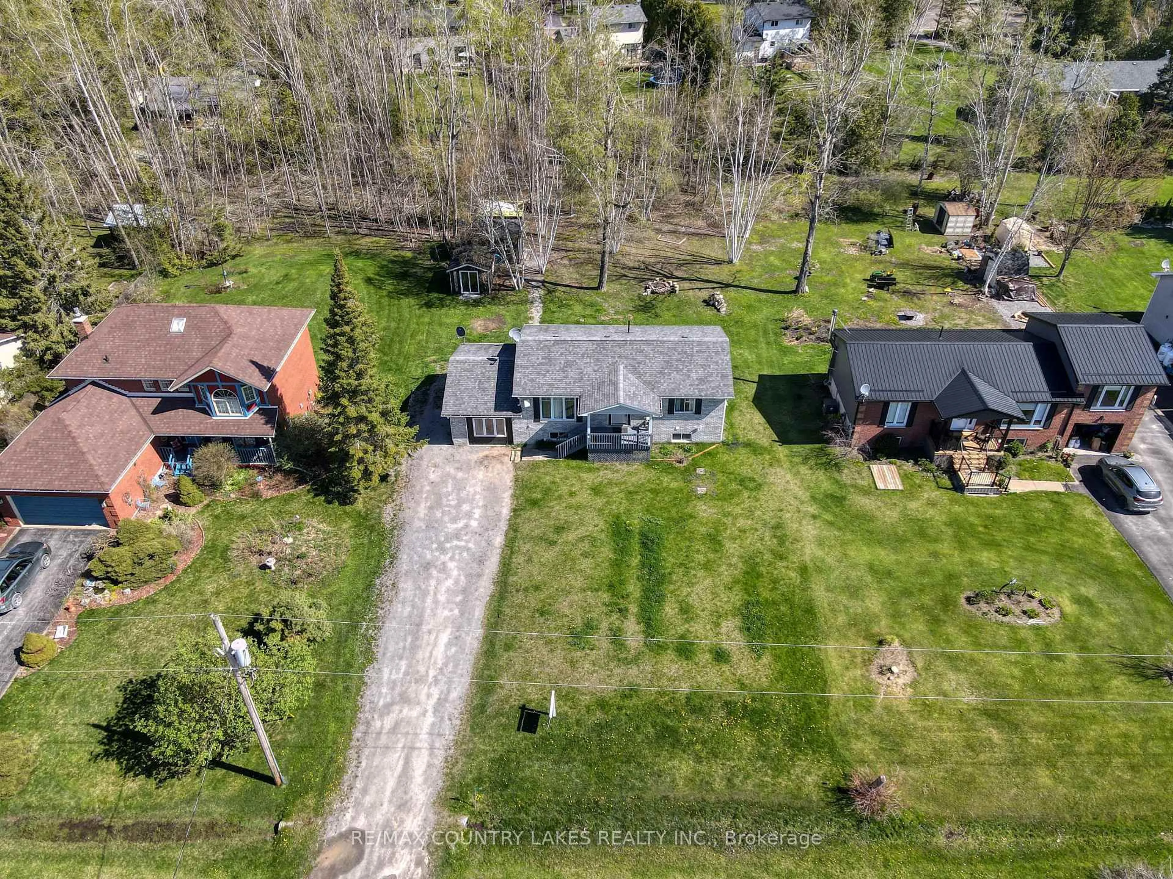 A pic from outside/outdoor area/front of a property/back of a property/a pic from drone, street for 40 Greenwood Cres, Kawartha Lakes Ontario K0M 2T0