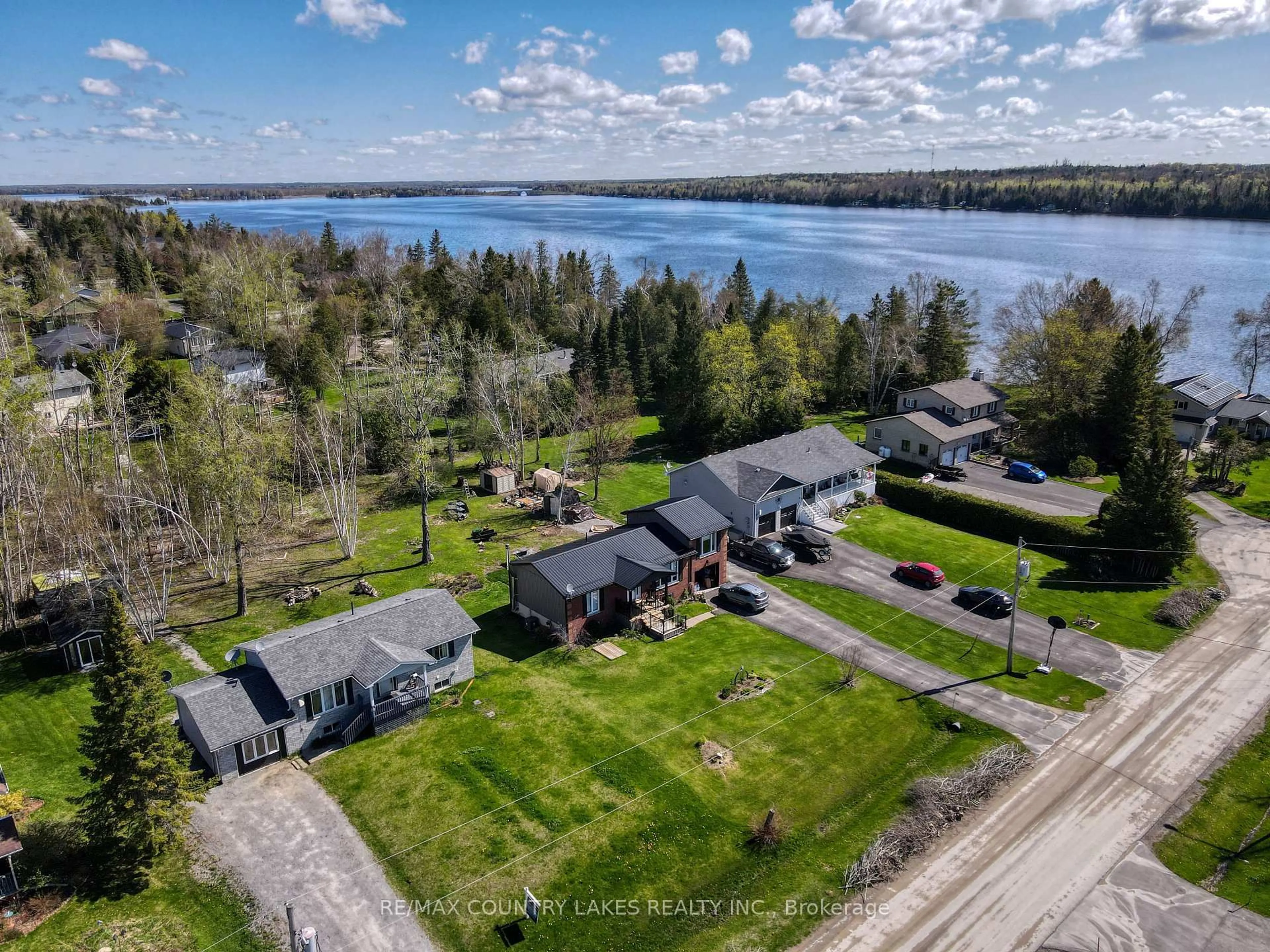 A pic from outside/outdoor area/front of a property/back of a property/a pic from drone, water/lake/river/ocean view for 40 Greenwood Cres, Kawartha Lakes Ontario K0M 2T0
