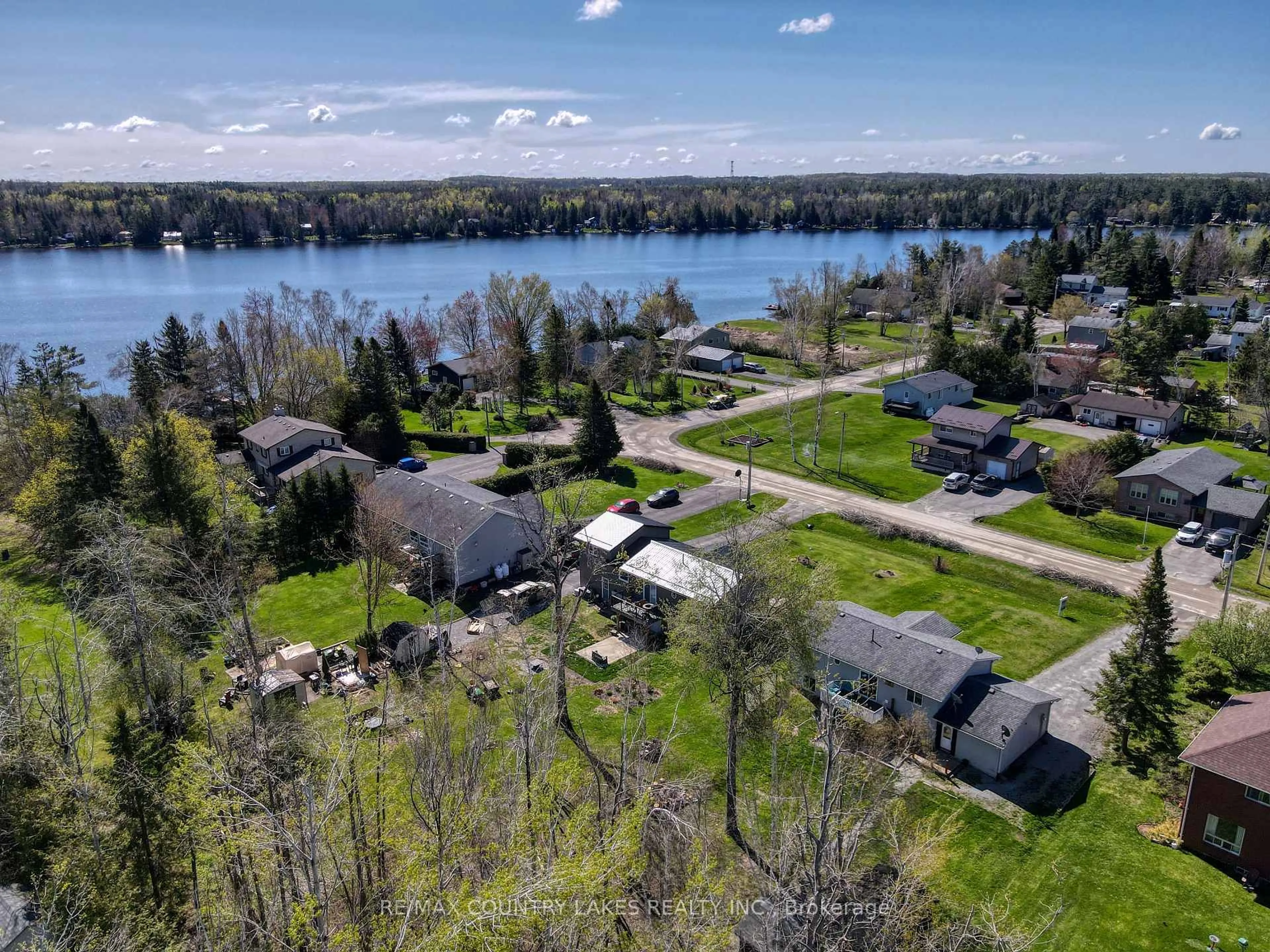 A pic from outside/outdoor area/front of a property/back of a property/a pic from drone, water/lake/river/ocean view for 40 Greenwood Cres, Kawartha Lakes Ontario K0M 2T0