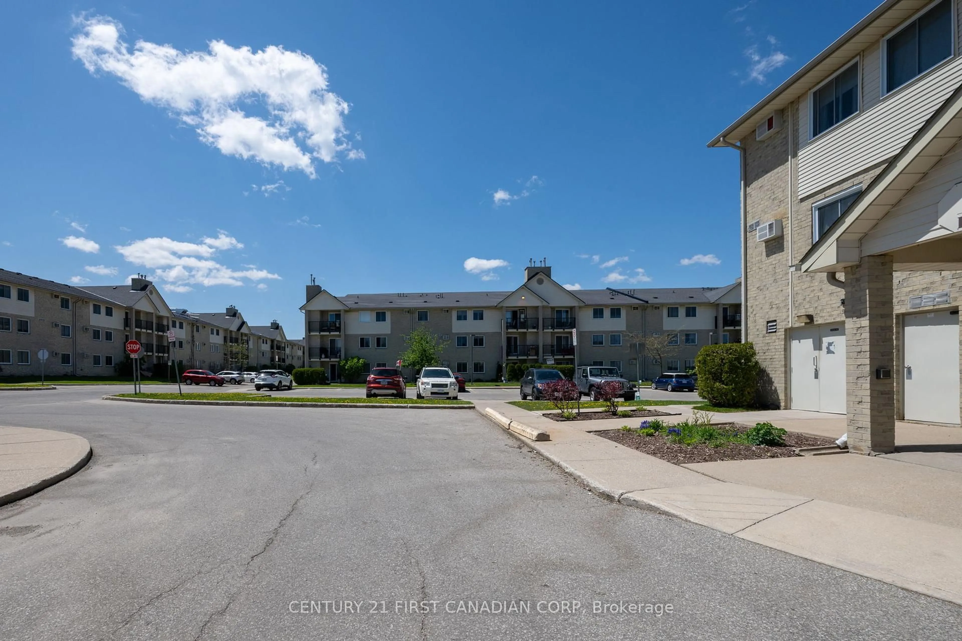 A pic from outside/outdoor area/front of a property/back of a property/a pic from drone, unknown for 739 Deveron Cres #203, London South Ontario N5Z 4Y1