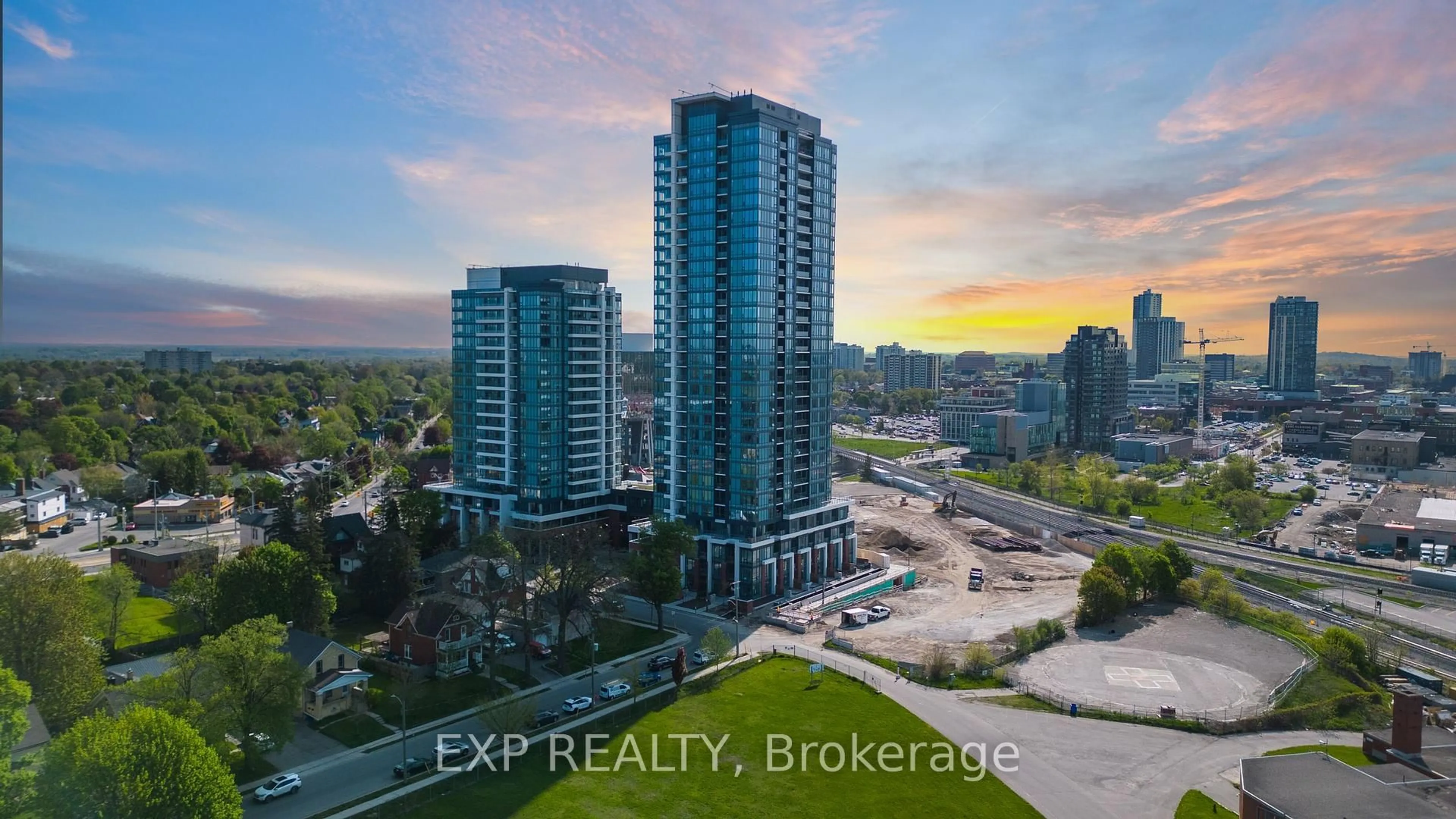 A pic from outside/outdoor area/front of a property/back of a property/a pic from drone, city buildings view from balcony for 15 Wellington St #510, Kitchener Ontario N2G 0E4