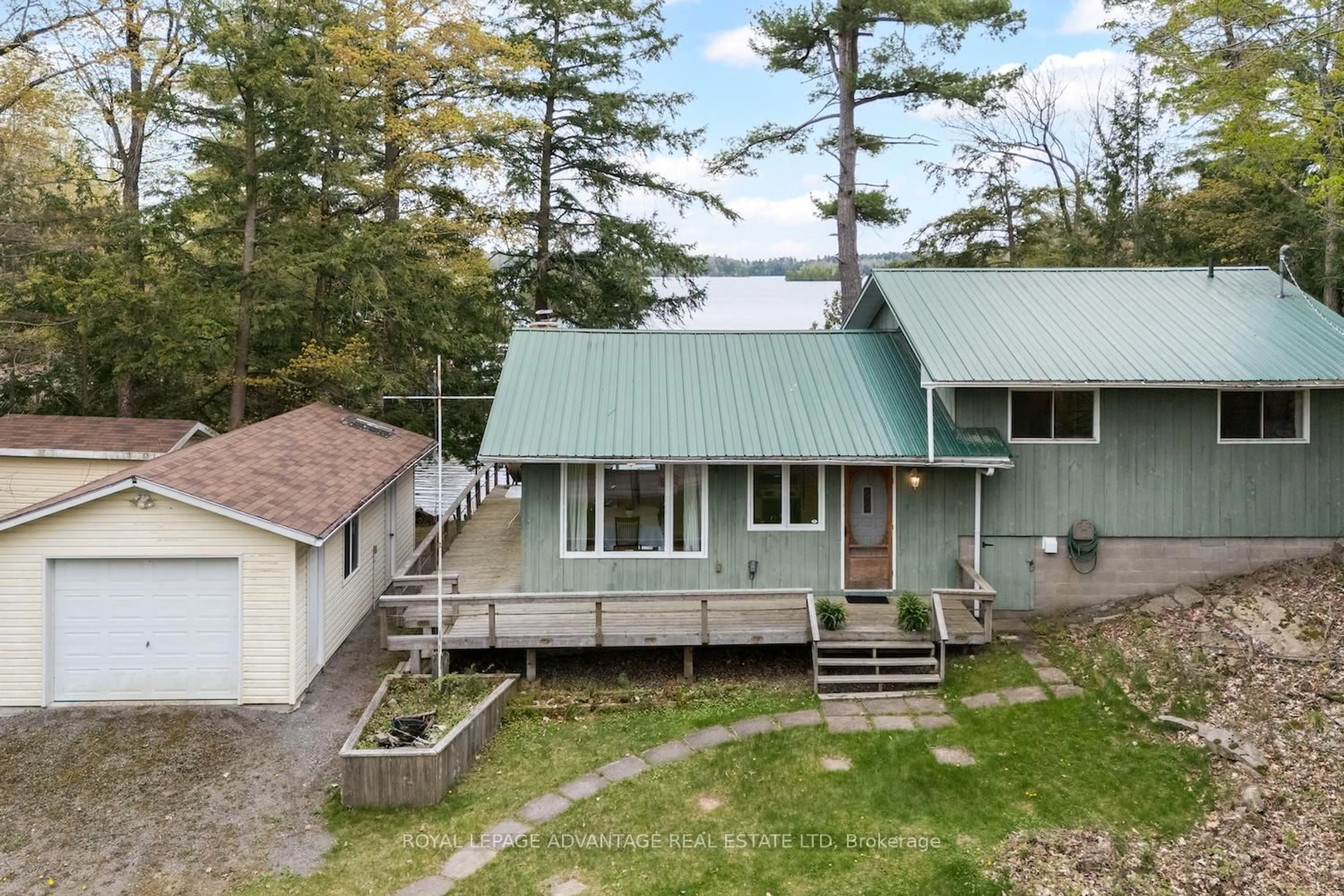 A pic from outside/outdoor area/front of a property/back of a property/a pic from drone, unknown for 765 Indian Lake Rd, Rideau Lakes Ontario K0G 1E0