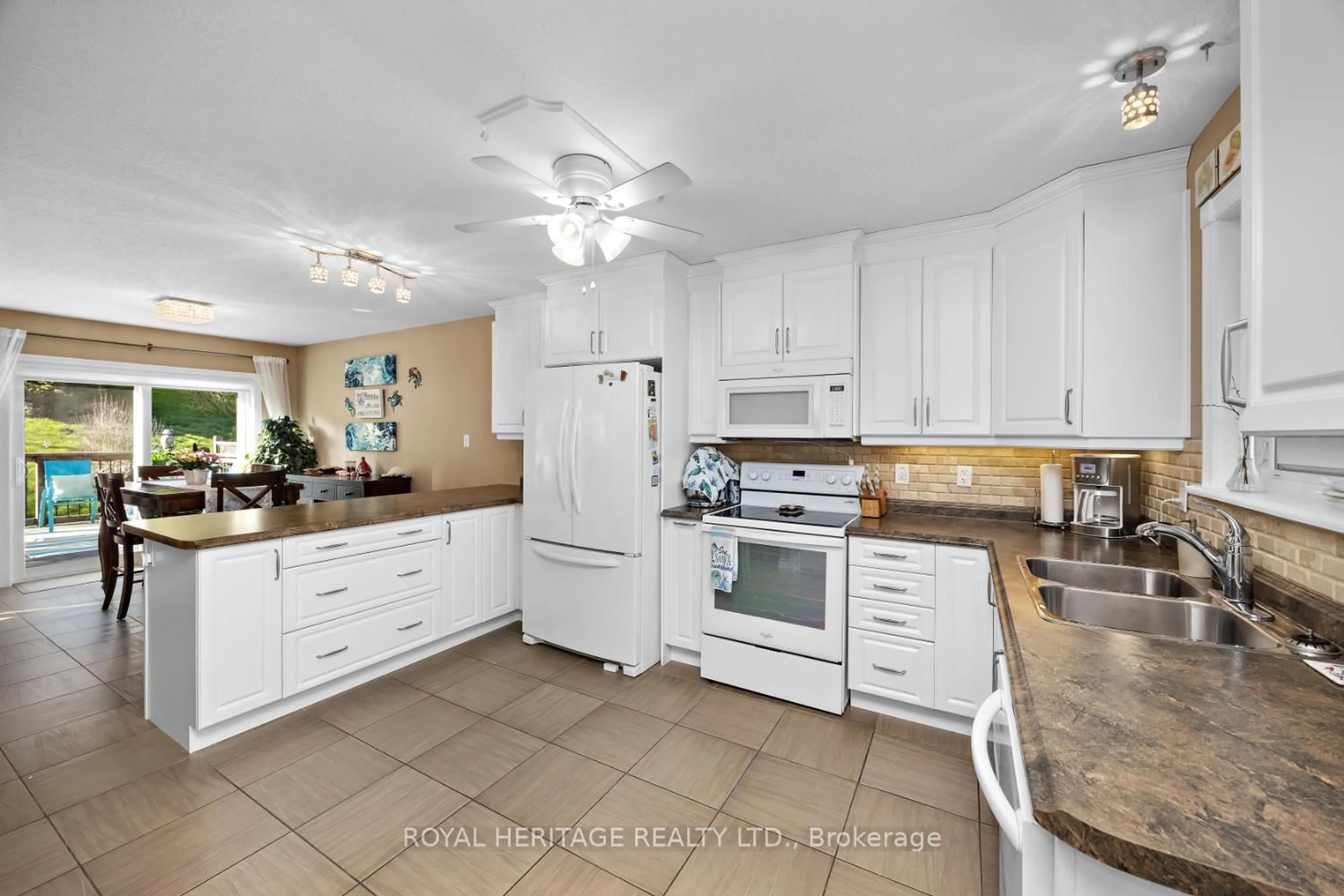 Open concept kitchen, ceramic/tile floor for 301 Carnegie Ave #162, Peterborough North Ontario K9L 0G1